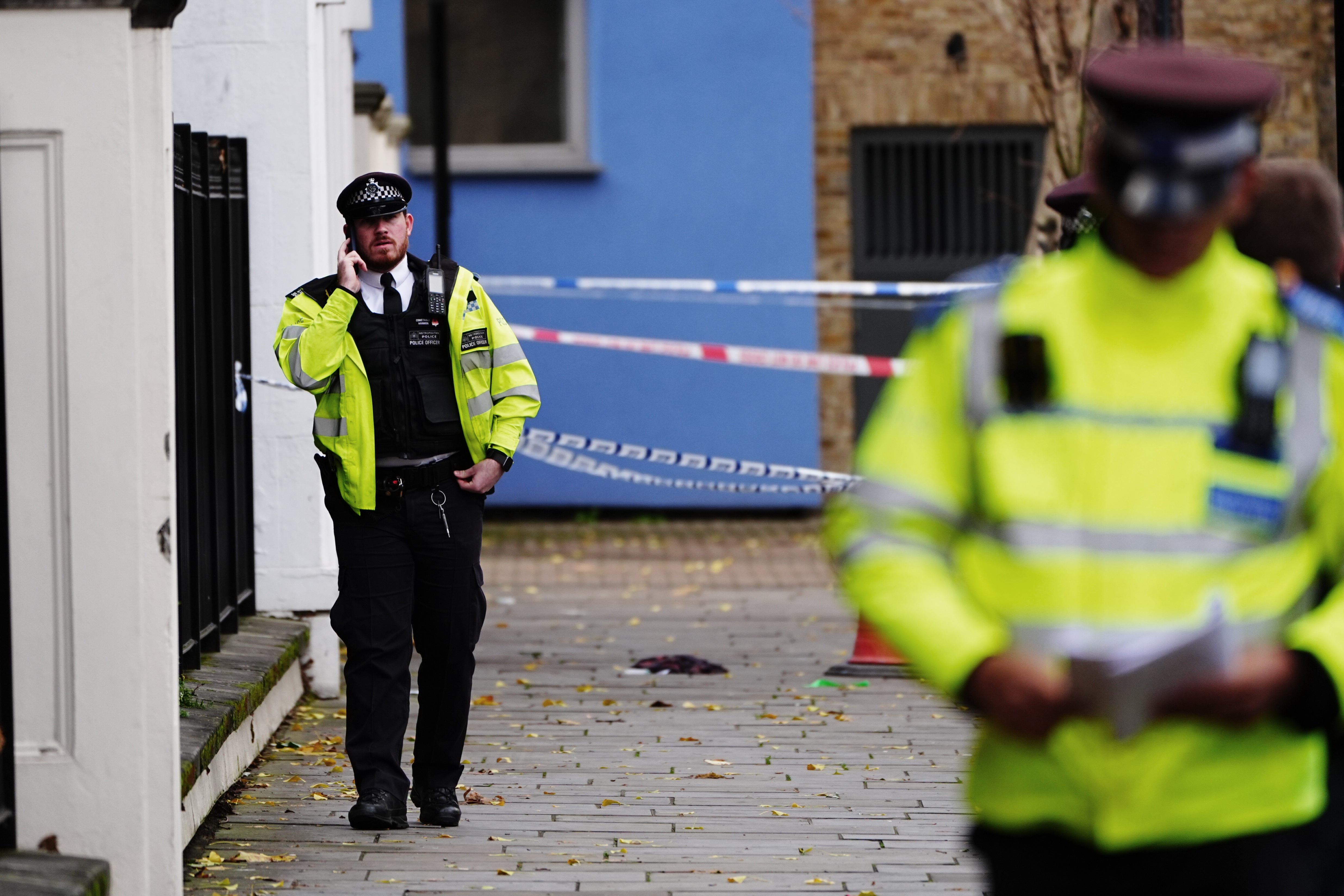 Police at the scene on Southern Grove in Ladbroke Grove, west London