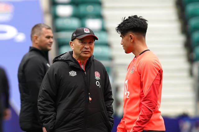 Eddie Jones (left) gave Marcus Smith (right) his Test debut in 2021 (Steve Parsons/PA)