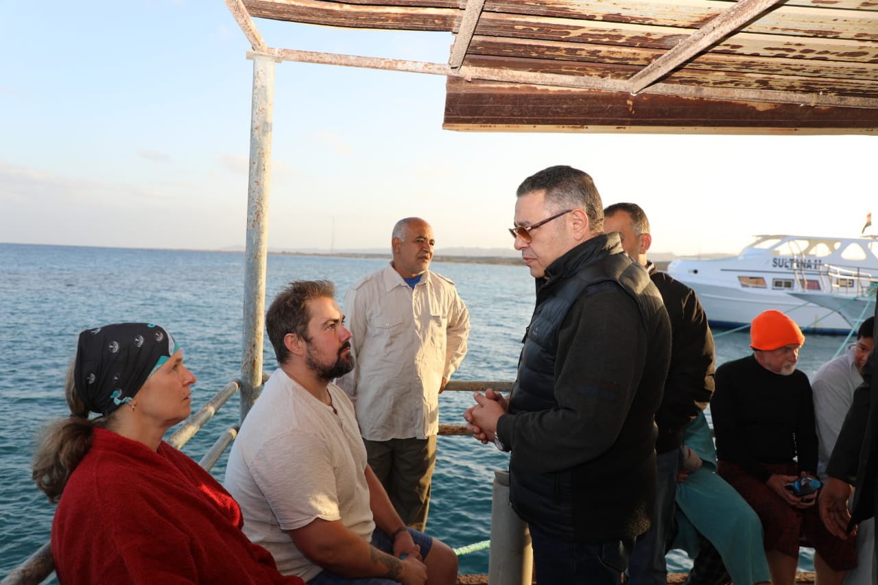 Egypt’s Red Sea governor Amr Hanafi speaks to survivors