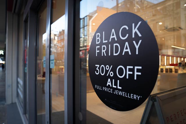<p>An advert in a shop for Black Friday (PA)</p>