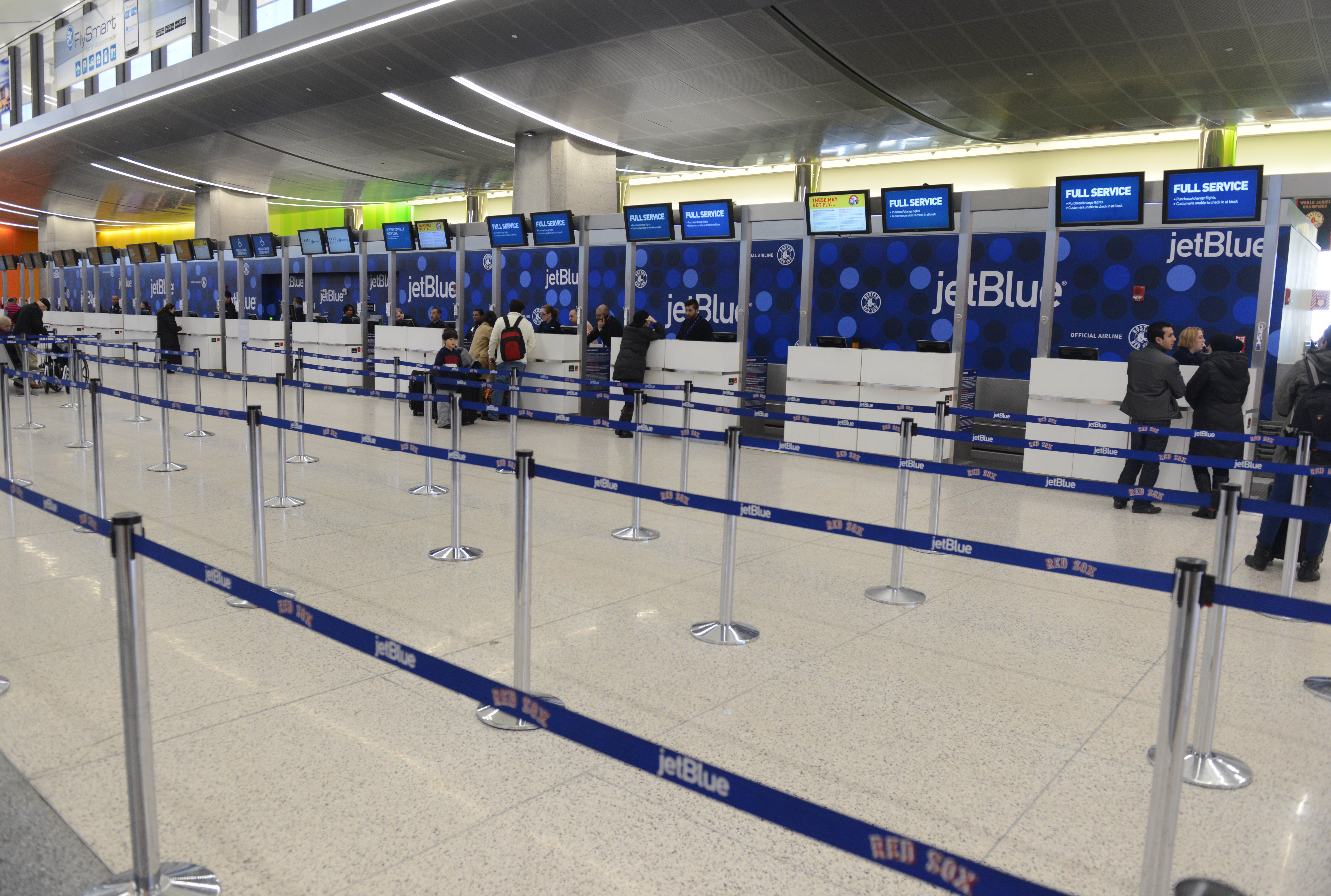 The JetBlue desk at Boston’s Logan International Airport. A tug vehicle towing an empty JetBlue plane struck a Cape Air plane on Monday afternoon.