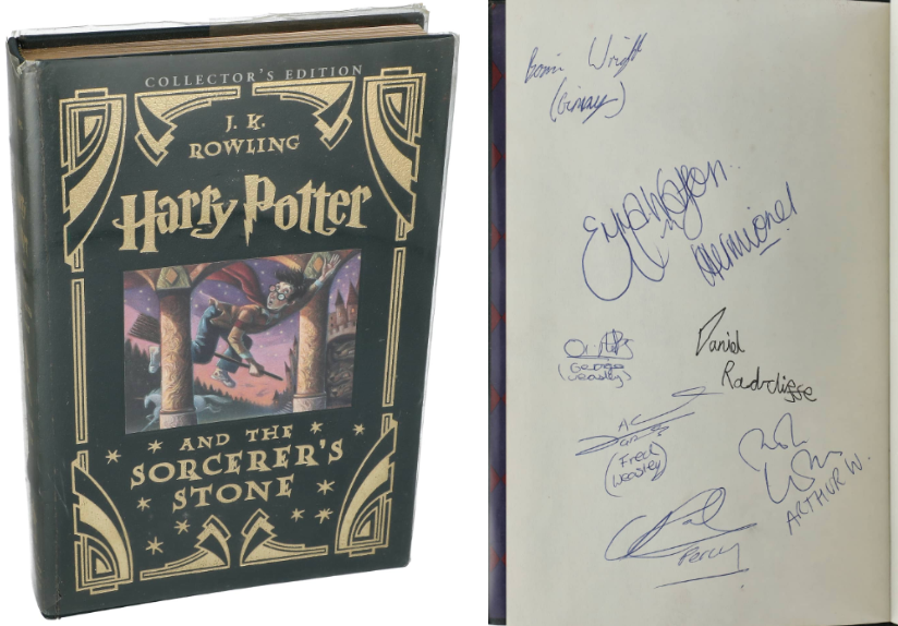 A first-edition copy of ‘Harry Potter and the Sorcerer’s Stone’ signed by cast members of the film, including Daniel Radcliffe and Emma Watson