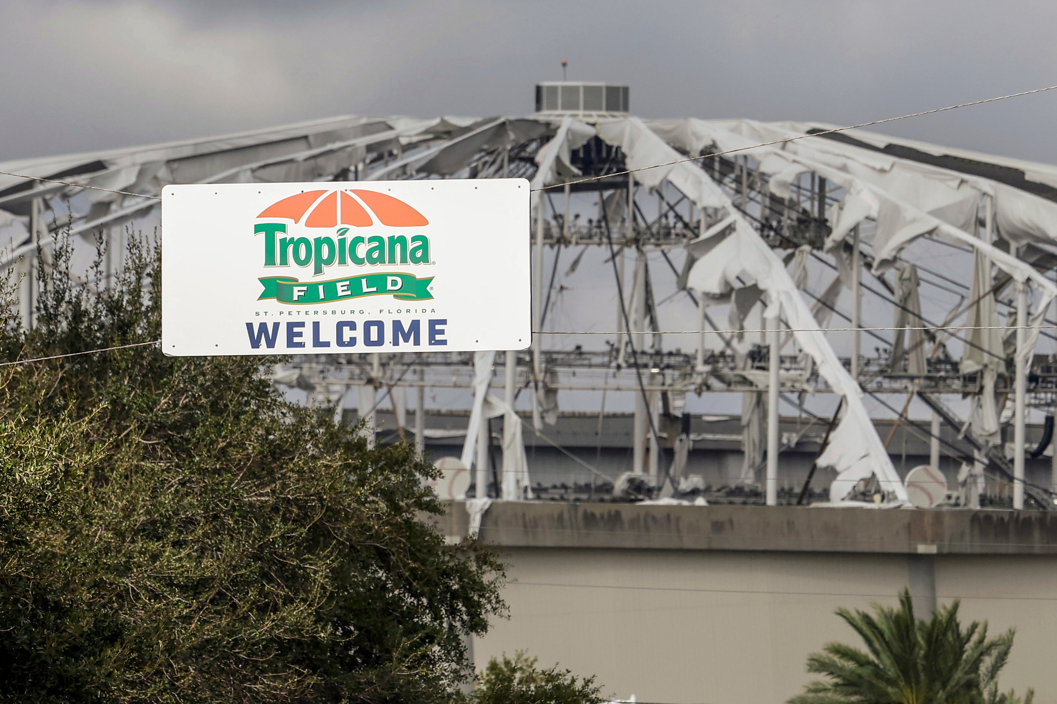 A sign is seen at Tropicana Field in St. Petersburg, Florida, last month. Hurricane Milton tore the roof off the field. Milton’s damage estimate is upwards of $180 billion