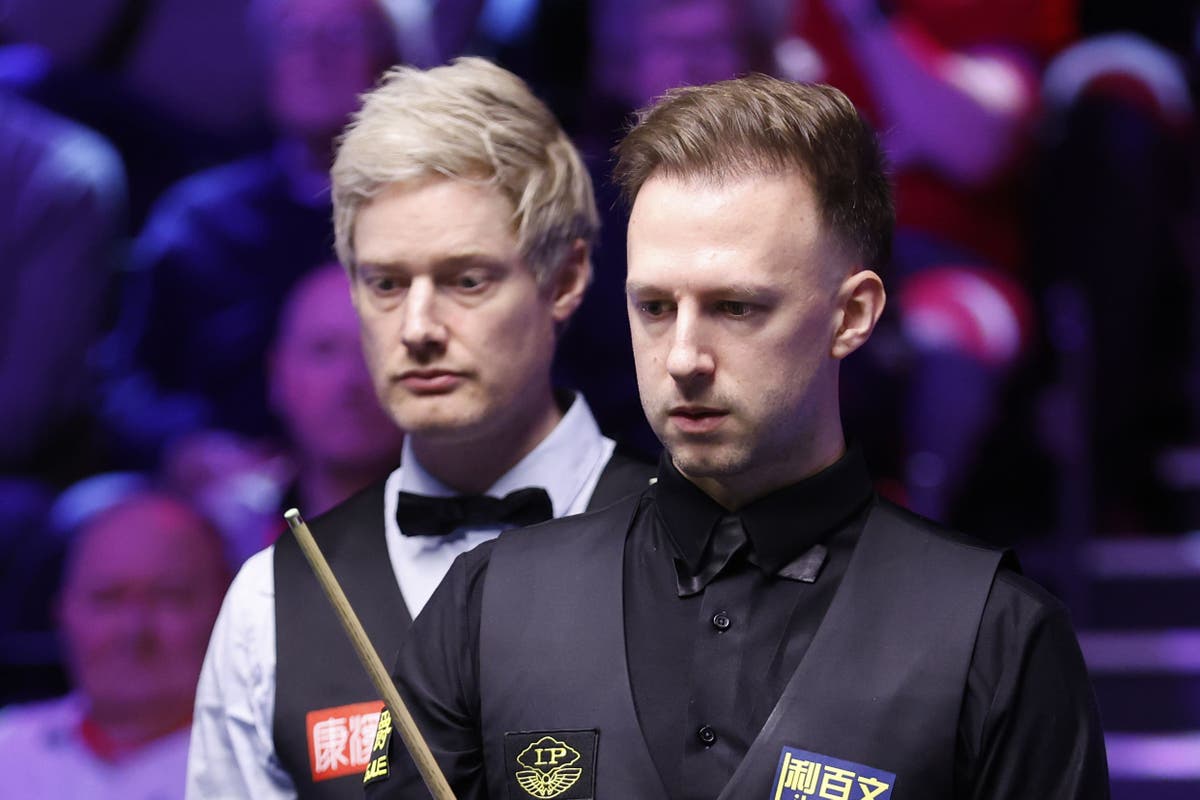 Judd Trump critical of table conditions after reaching last 16 in York