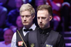 Judd Trump critical of table conditions after reaching last 16 in York