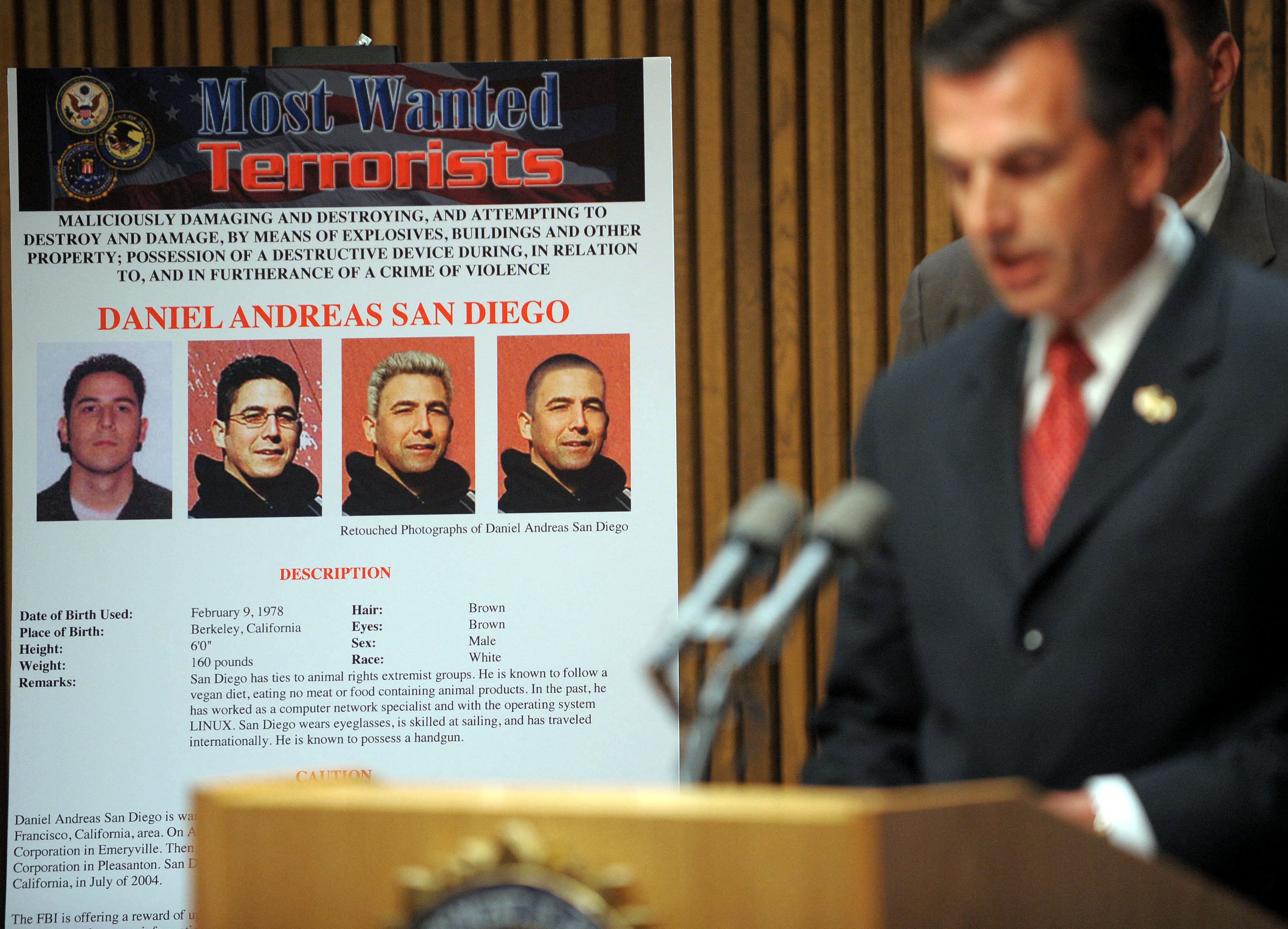 A photo from 2009 showing FBI Assistant Director of the Counterterrorism Division Michael J. Heimbach announcing Daniel Andreas San Diego as the latest addition to the FBI’s “Most Wanted Terrorist List”