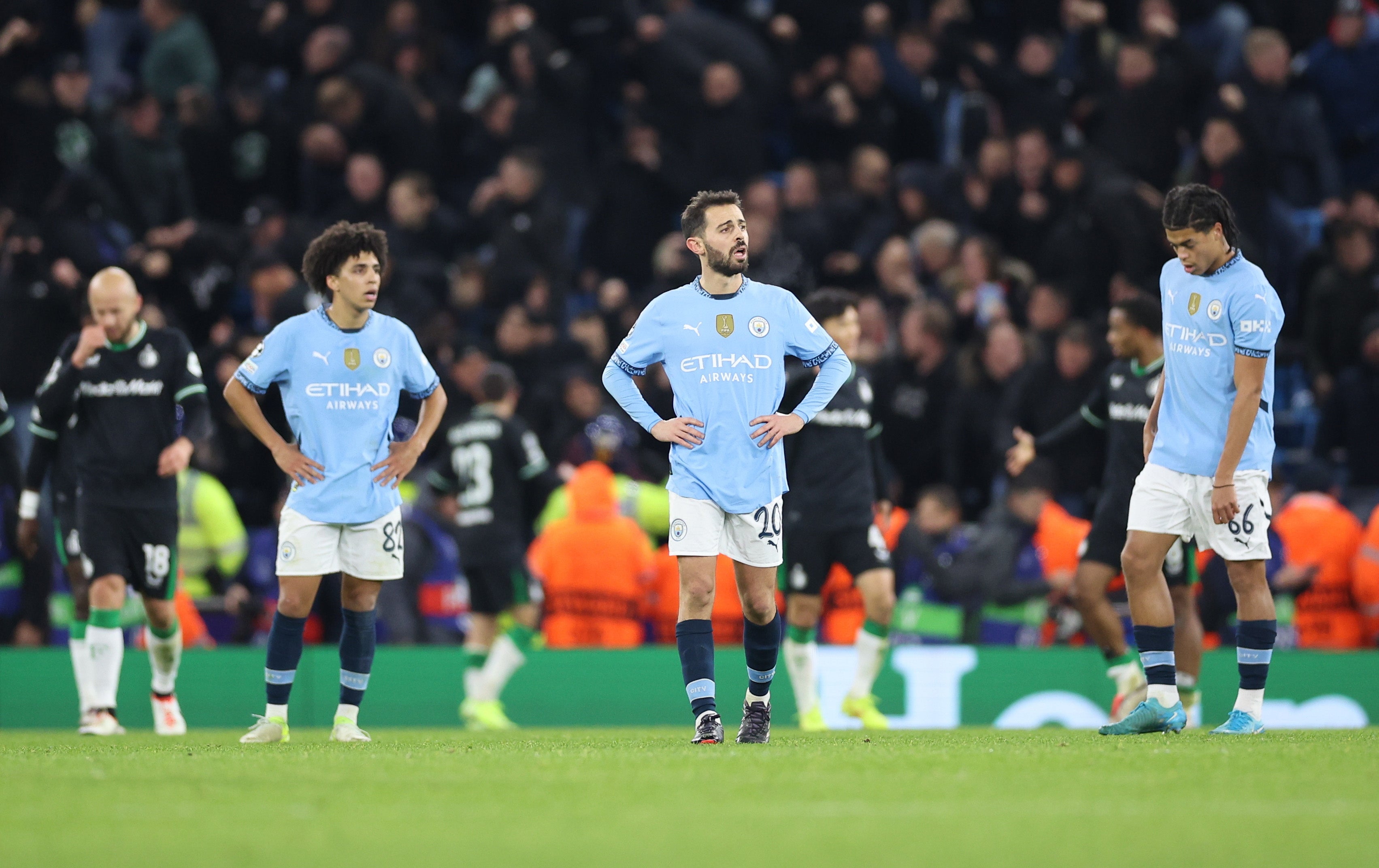 Manchester City’s players react after Feyenoord’s leveller