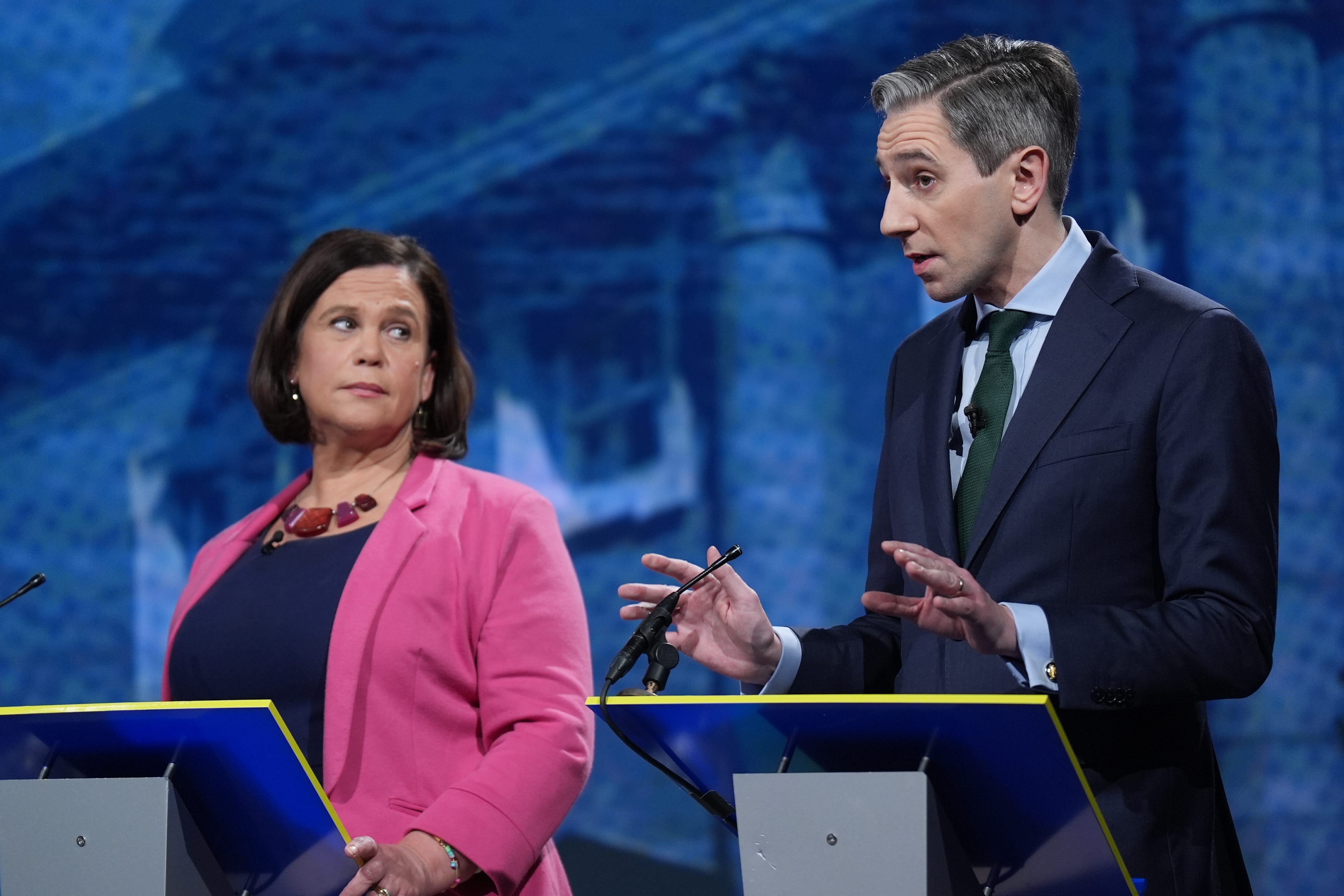 Sinn Fein leader Mary Lou McDonald and Taoiseach and Fine Gael leader Simon Harris (Niall Carson/PA)