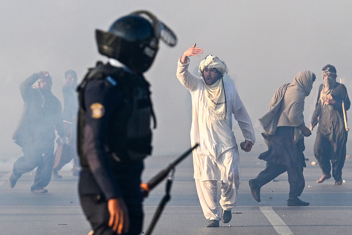 Pakistan police launch massive midnight raid and push back Imran Khan’s supporters from heart of capital