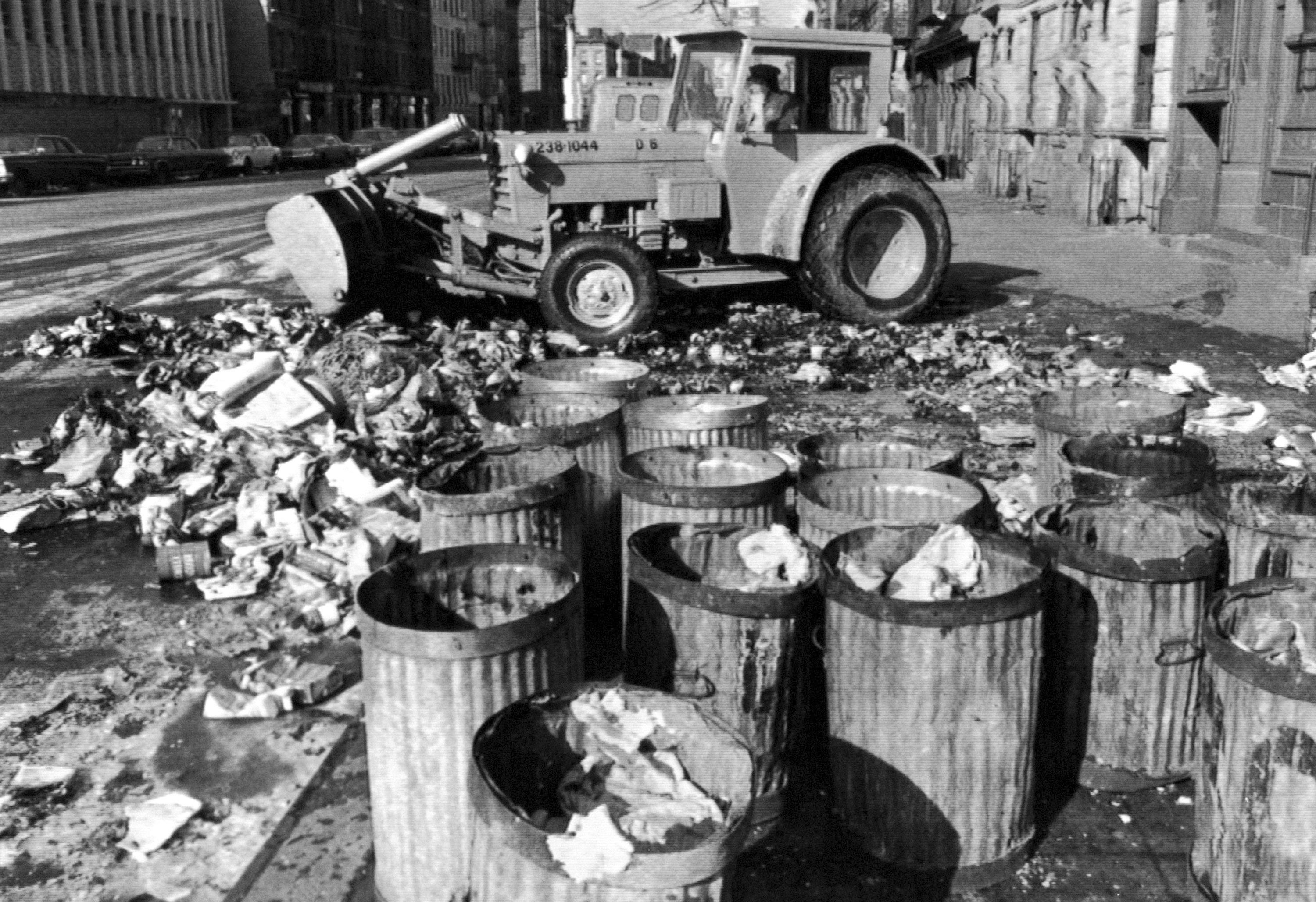 Empty garbage cans sit on a Harlem street in the Manhattan borough of New York, Feb. 11, 1968