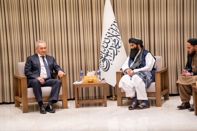 <p>Russian secretary of security council Sergei Shoigu sits down with the Taliban’s minister of interior affairs Sirajuddin Haqqani</p>