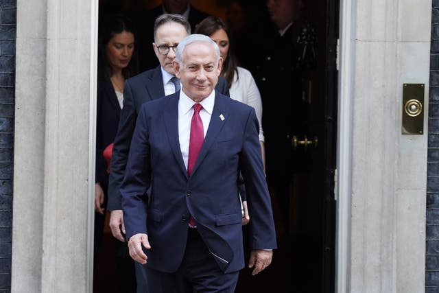 Israeli Prime Minister Benjamin Netanyahu leaves 10 Downing Street, London, following a meeting with then prime minister Rishi Sunak (Stefan Rousseau/PA)