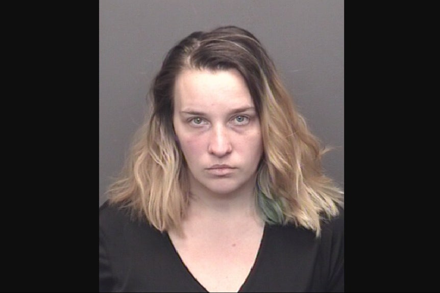 Christin Jade Donat, 26, (pictured in mugshot) was charged with two counts of child neglect