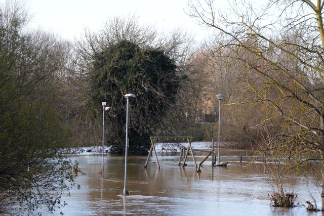 A children’s play area under flood water near Billing Wharf, Northamptonshire (Bradley Collyer/PA)