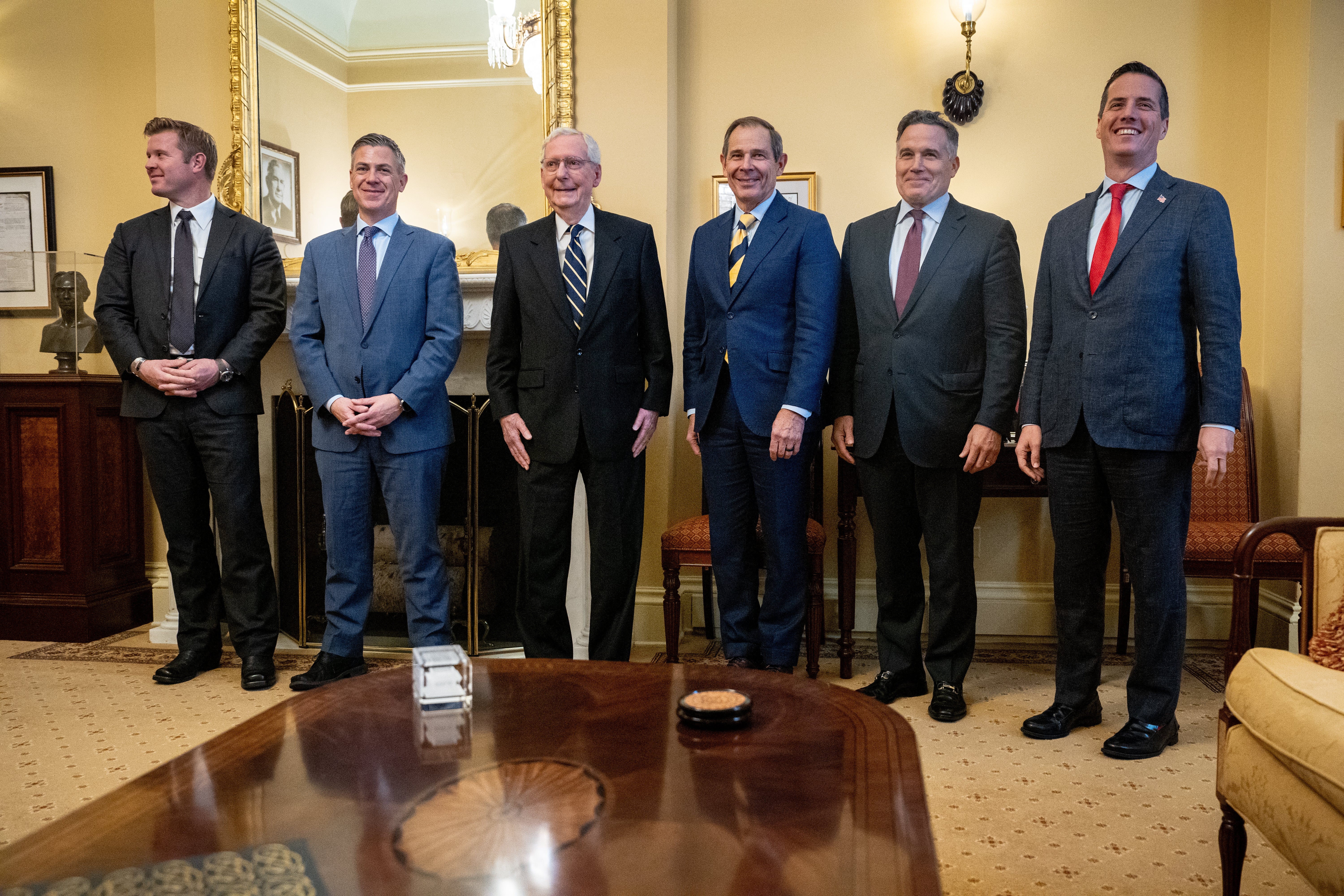 Senate Minority Leader Mitch McConnell (center) will likely break with Trump on topics like the war in Ukraine while John Curtis, to his right, will likely make breaks on Trump’s nominations.