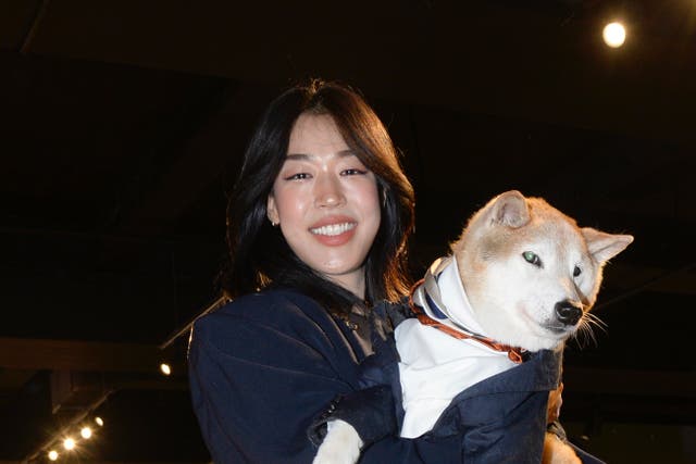 <p>Menswear Dog and his owner Yena Kim attend the Lost Pattern show during New York Fashion Week on September 11, 2024</p>