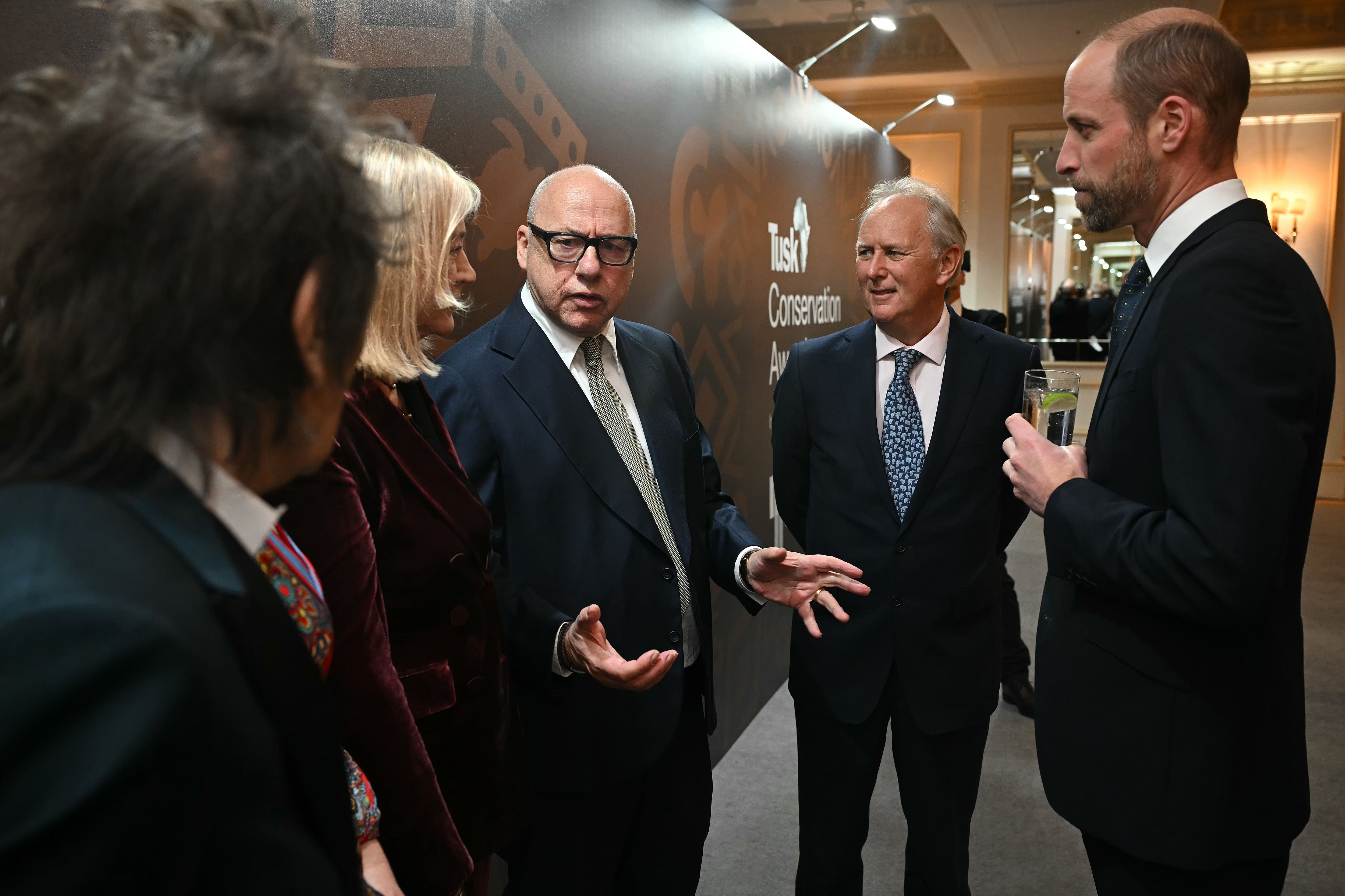 The Prince of Wales meets Ronnie Wood of the Rolling Stones (left) and Dire Straits’ Mark Knopfler (centre) ahead of the Tusk Conservation Awards (Justin Tallis/PA)