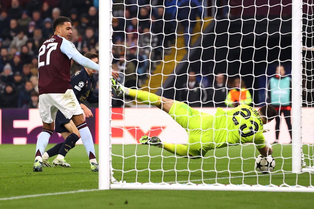 Keeper Emi Martinez saves from Juve’s Andrea Cambiaso