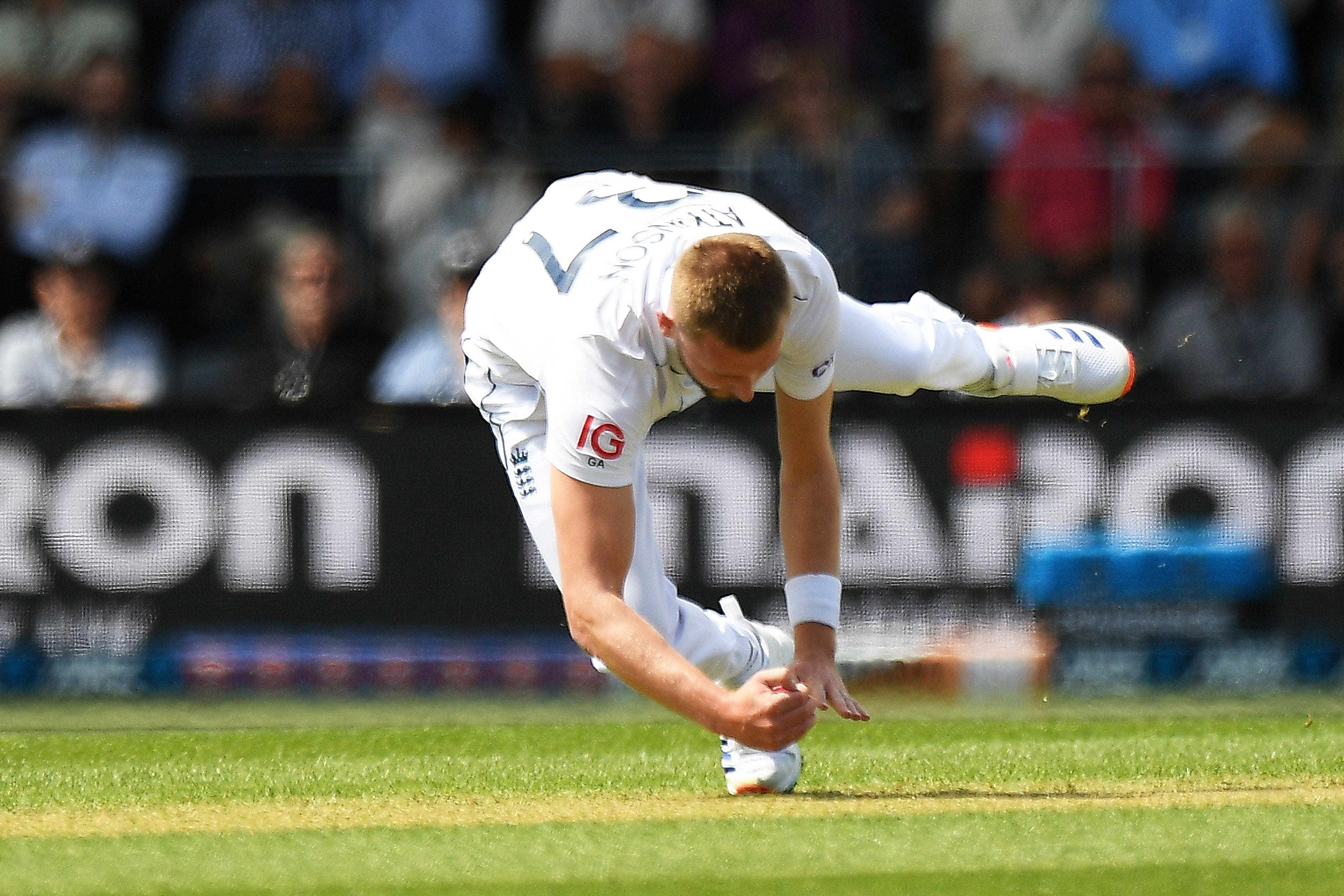 England’s Gus Atkinson takes a catch off his own bowling to dismiss New Zealand’s Devon Conway (Chris Symes/Photosport /AP)