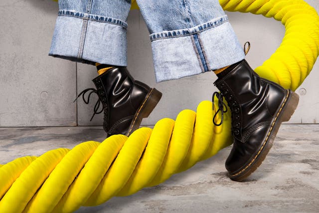 Dr Martens has revealed it swung to a half-year loss after seeing sales slump and warned of a year-end currency hit to profits (Dr Martens/PA)