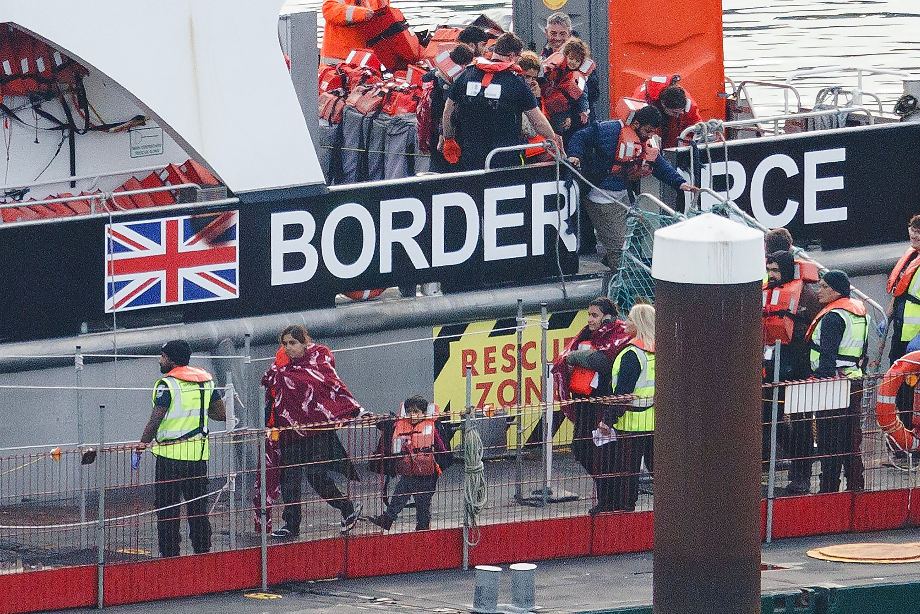 A Border Force vessel carrying around 100 migrants, including several children arrives at Dover port on October 31, 2024 in Dover, England.