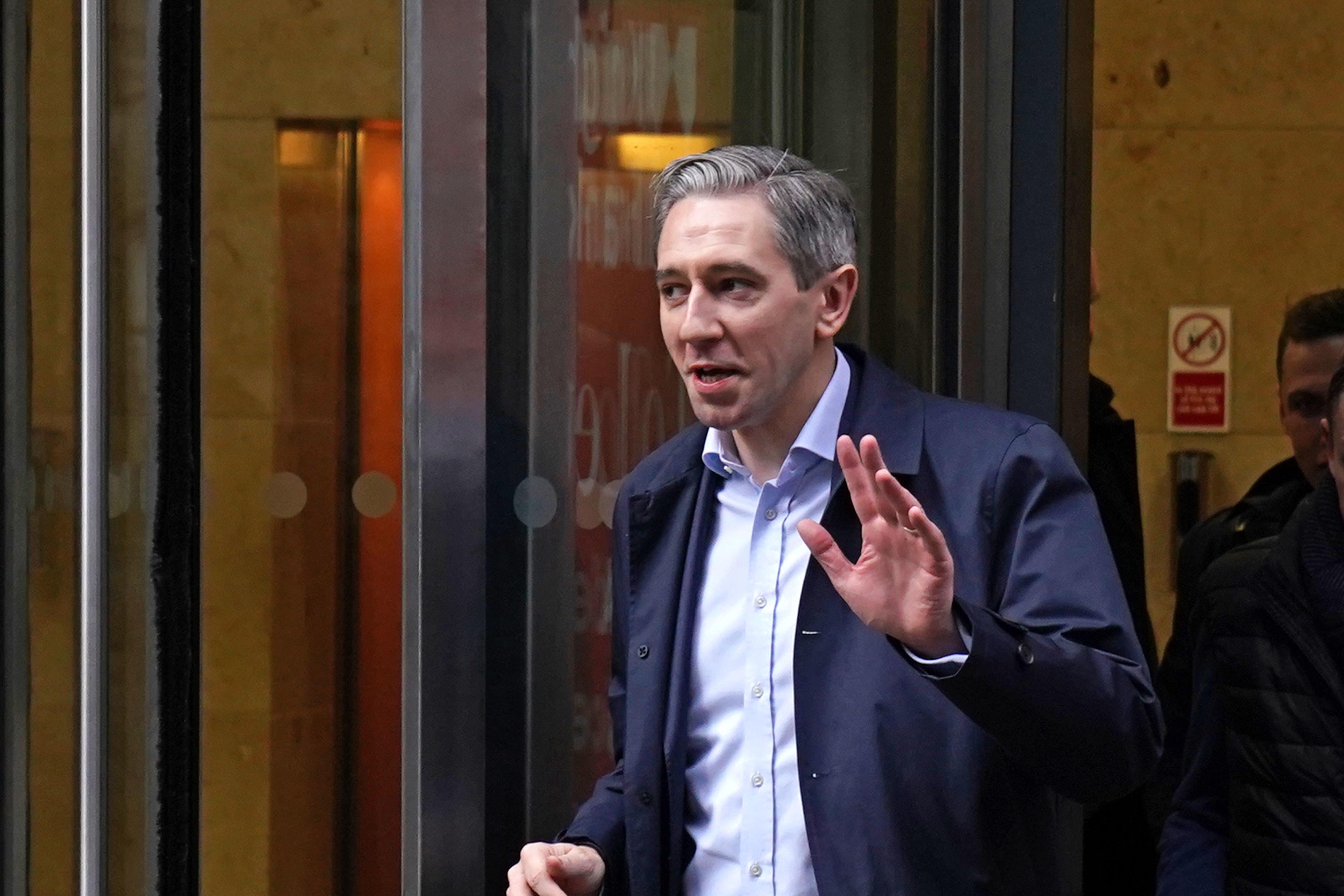 Taoiseach and Fine Gael leader Simon Harris leaves Marconi House in Dublin after speaking on Newstalk’s Pat Kenny show (PA)