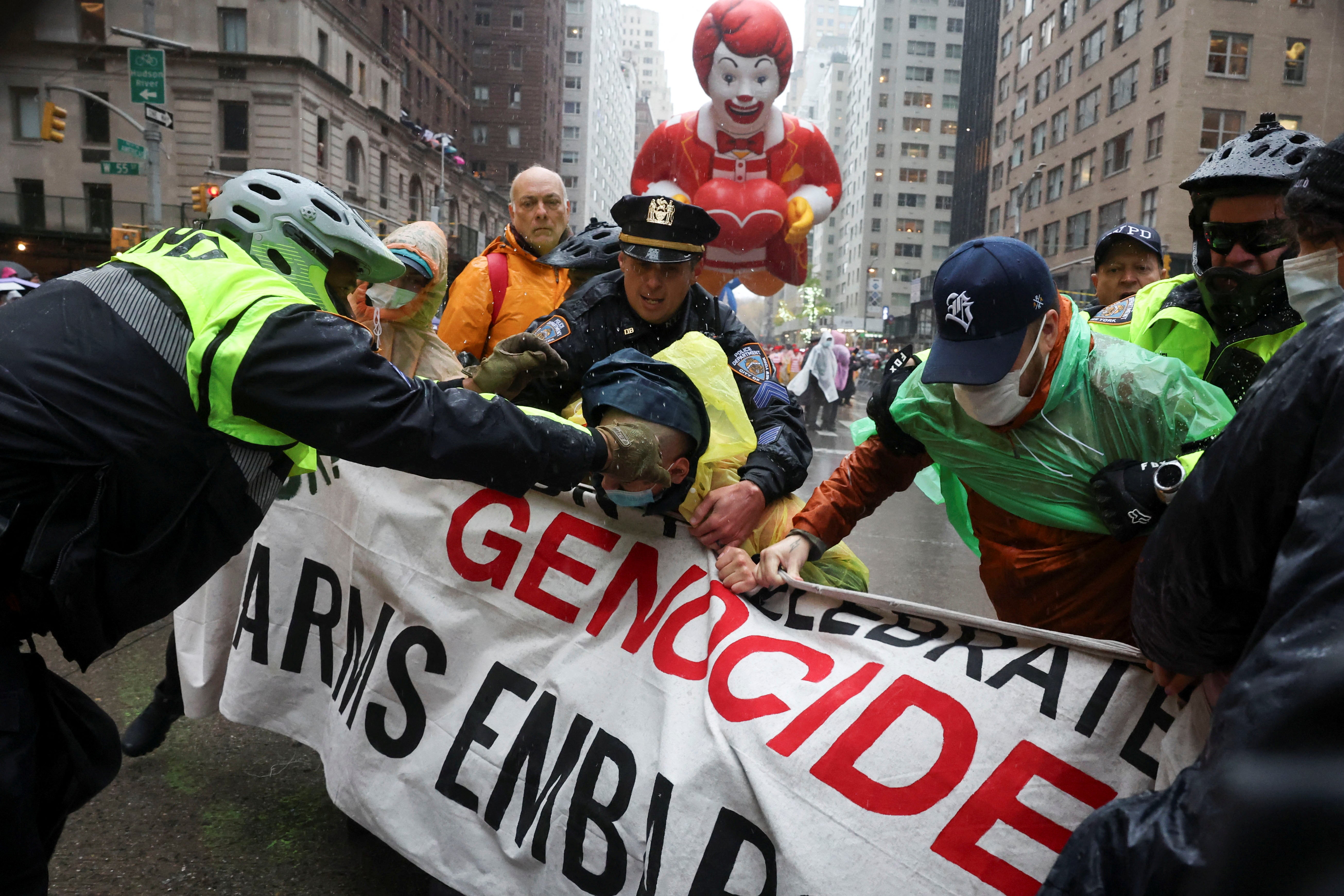 Police clash with pro-Palestinian protesters who disrupted the Macy’s Thanksgiving Day Parade. Around 21 people were arrested, according to local media reports