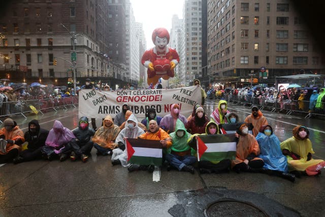 <p>Pro-Palestinian protesters interrupt the Macy’s Thanksgiving Day Parade on Thursday</p>