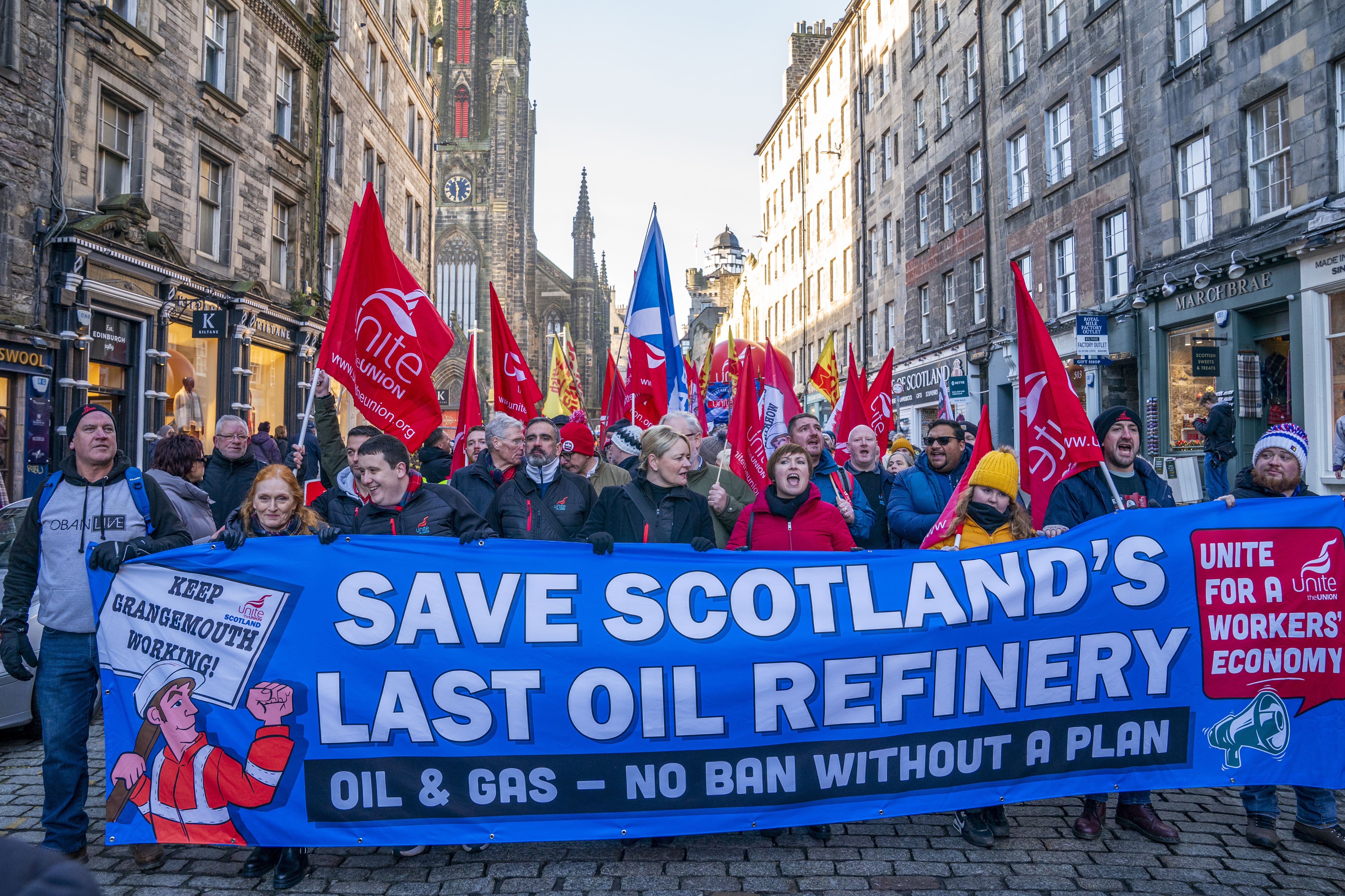 Members of the Unite union march and rally at the Scottish Parliament in protest at Petroineos plans to close Grangemouth oil refinery.