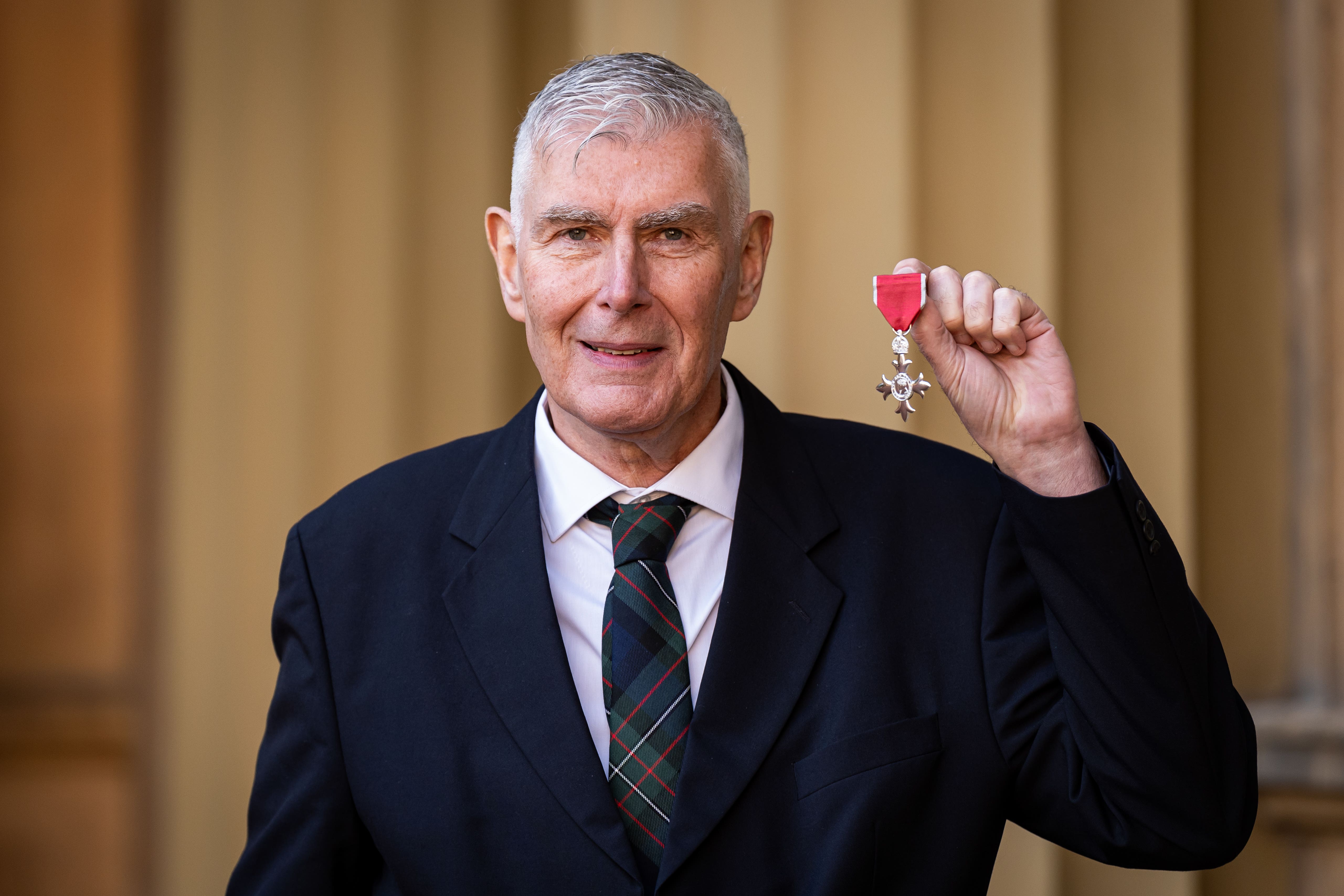 Stuart Cossar after being made an MBE (Aaron Chown/PA)