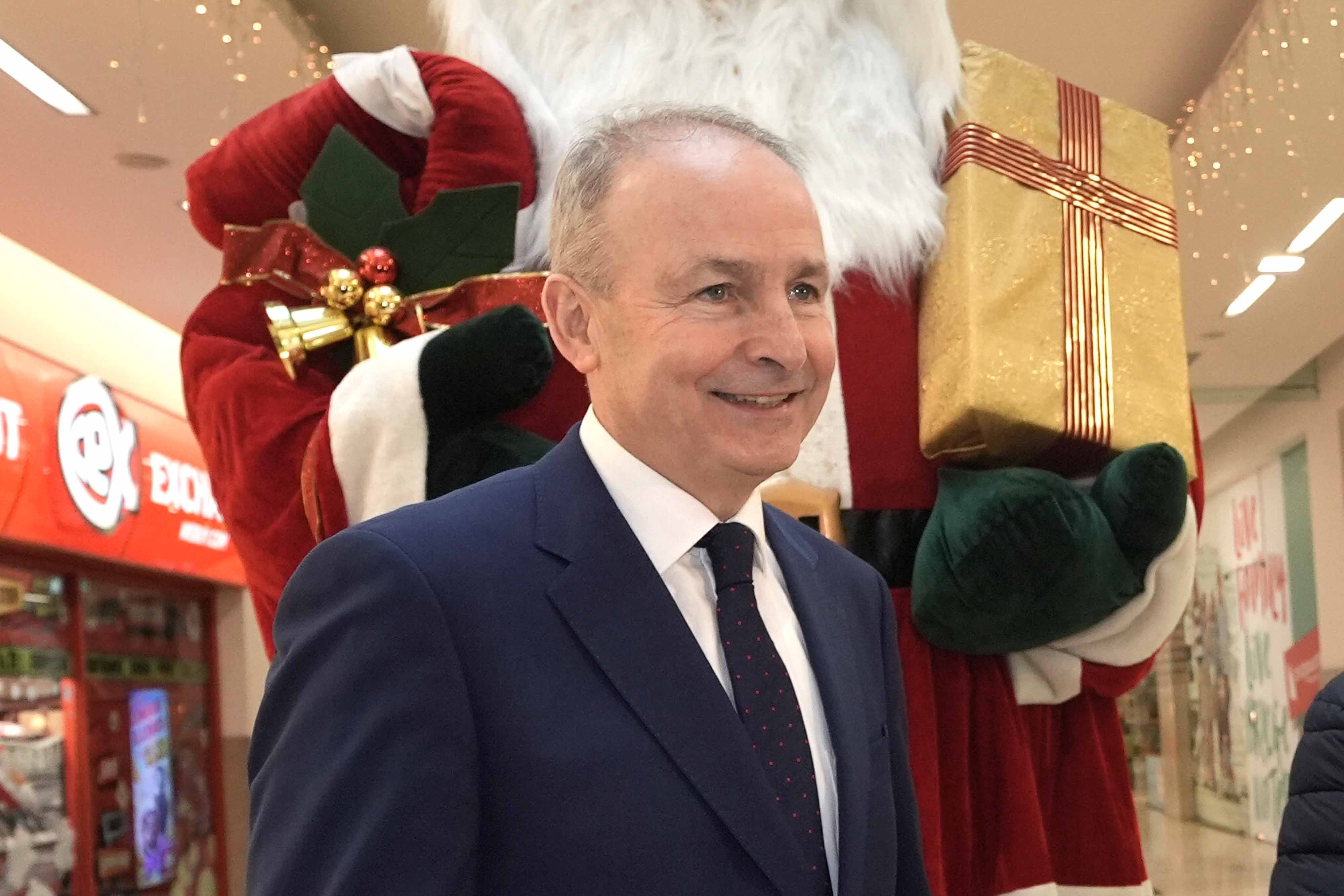 Fianna Fail leader Micheal Martin canvassing at Bridgewater Shopping Centre (PA)