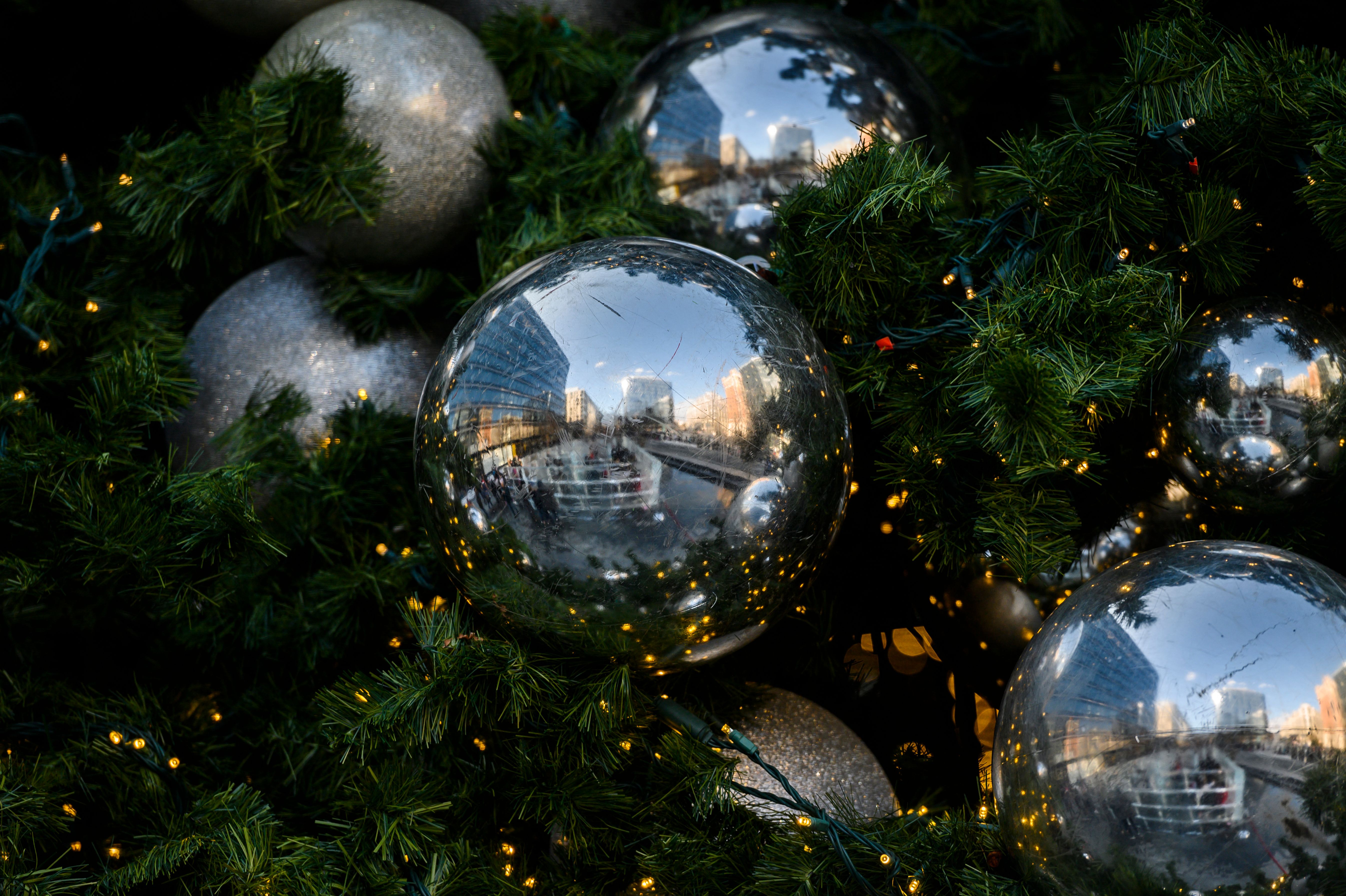 A man sustained life-threatening injuries after an electric shock while hanging Christmas lights in Massachusetts on Wednesday