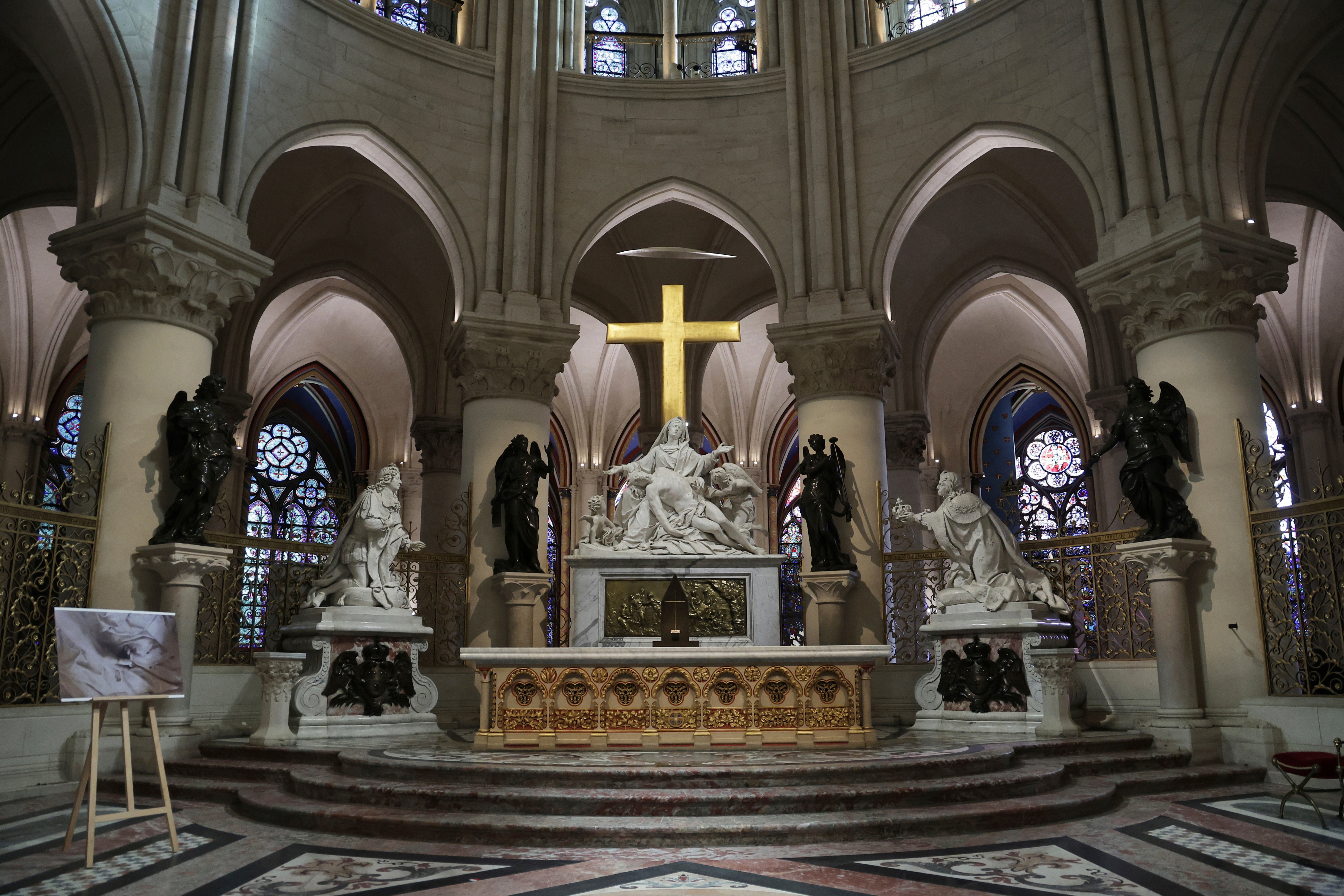 The altar of the cathedral, which is one of the French capital’s most beloved and visited monuments, is seen