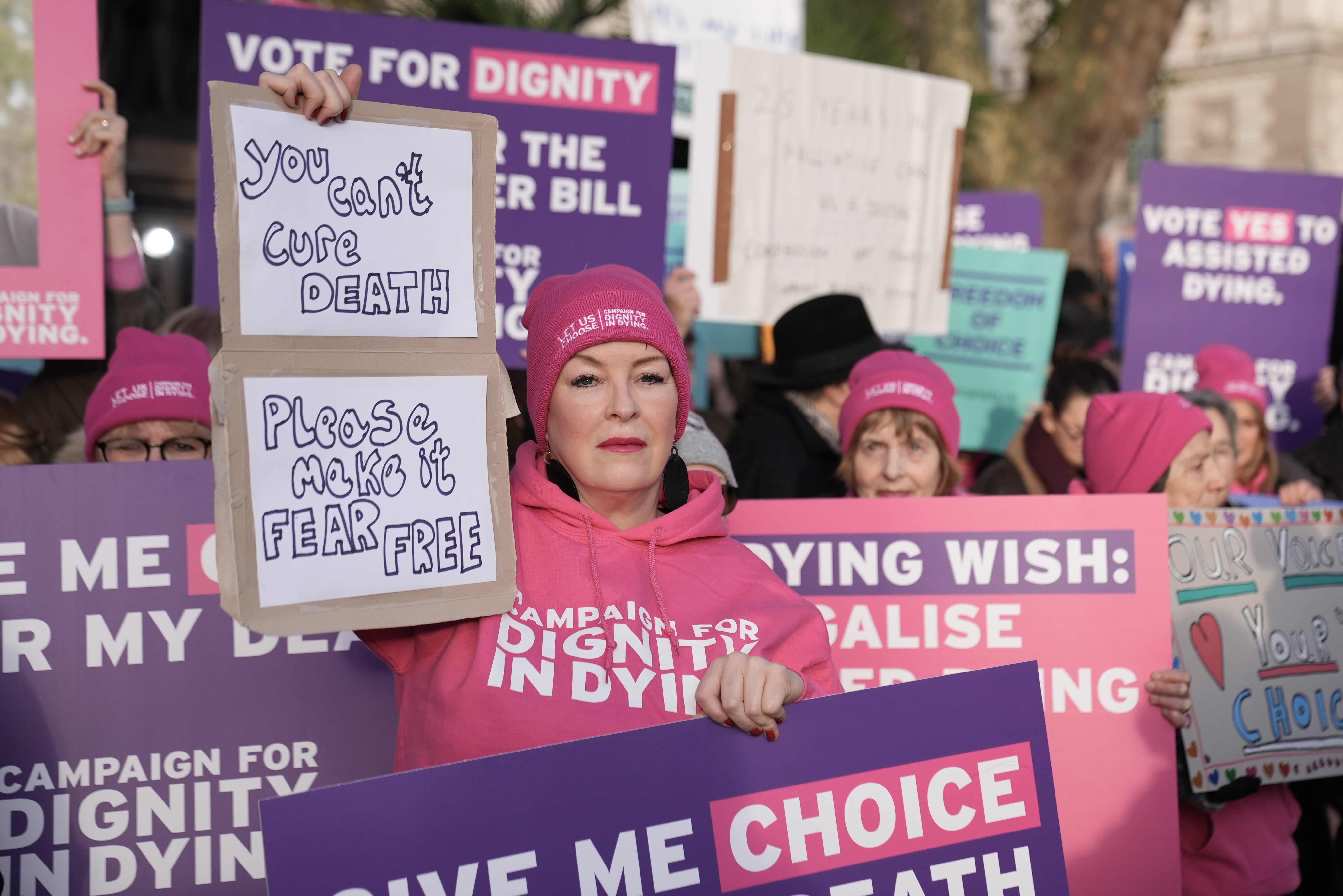 People took part in a demonstration organised by Dignity in Dying outside the Parliament as MPs debated the assisted dying bill