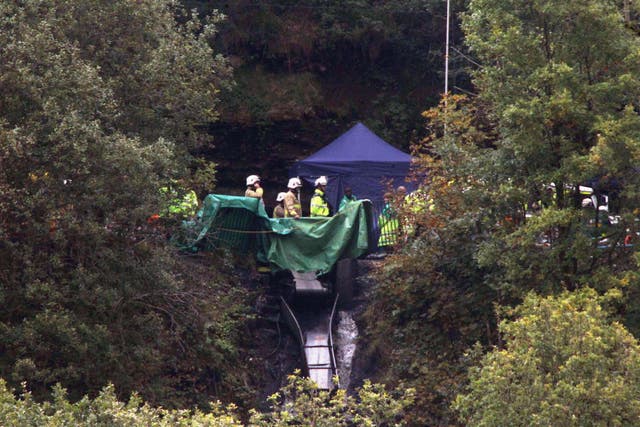 Rescue workers at the Gleision Colliery following the disaster (PA)