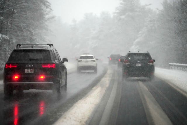 <p>Drivers in Lebanon, New Hampshire, move through the first snowstorm of the season on Thursday. This weekend will see temperatures plunge across the US and into next week </p>