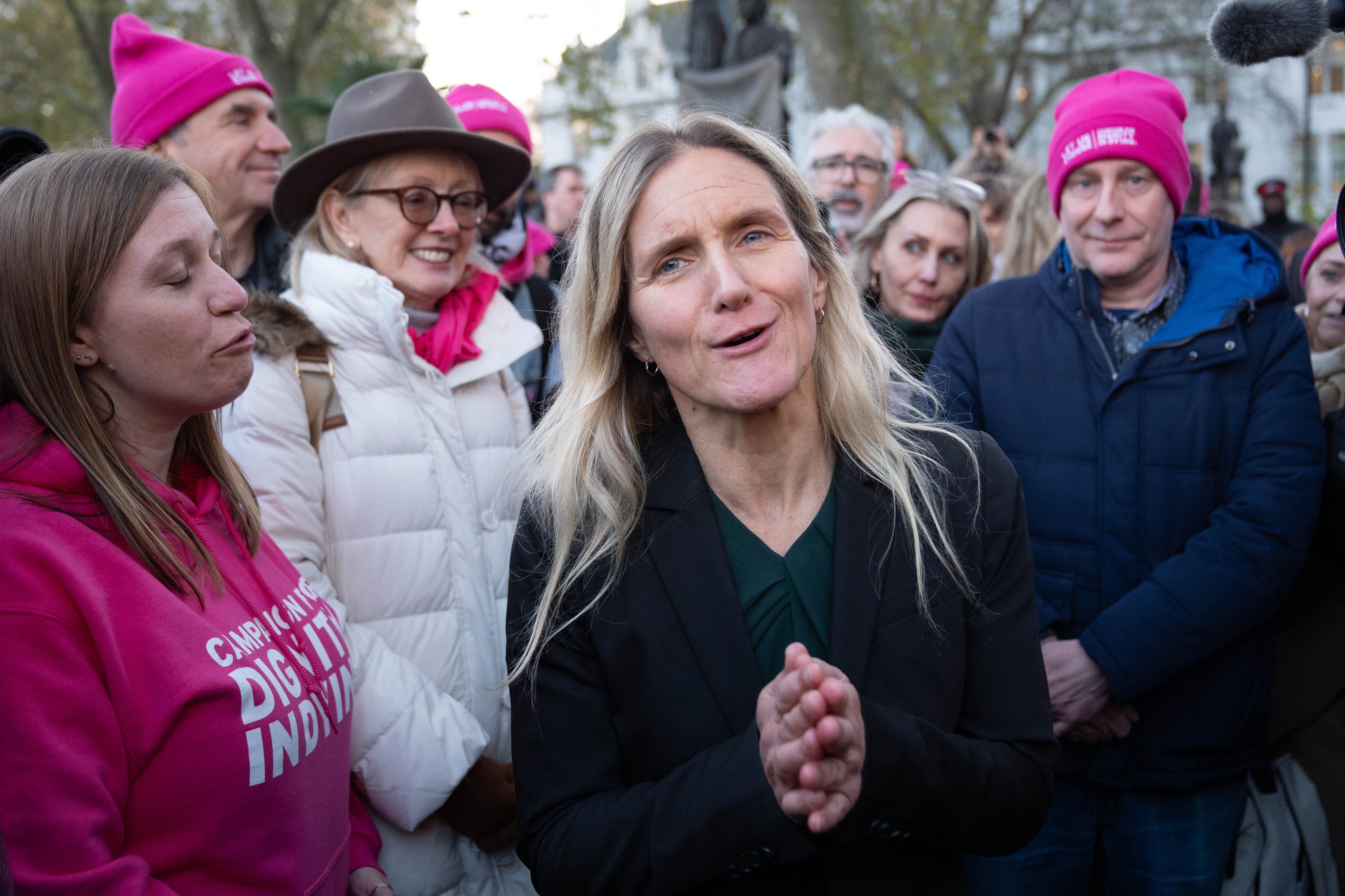 Kim Leadbeater joins supporters in Parliament Square in London after hearing the result of the vote in parliament (Stefan Rousseau/PA)