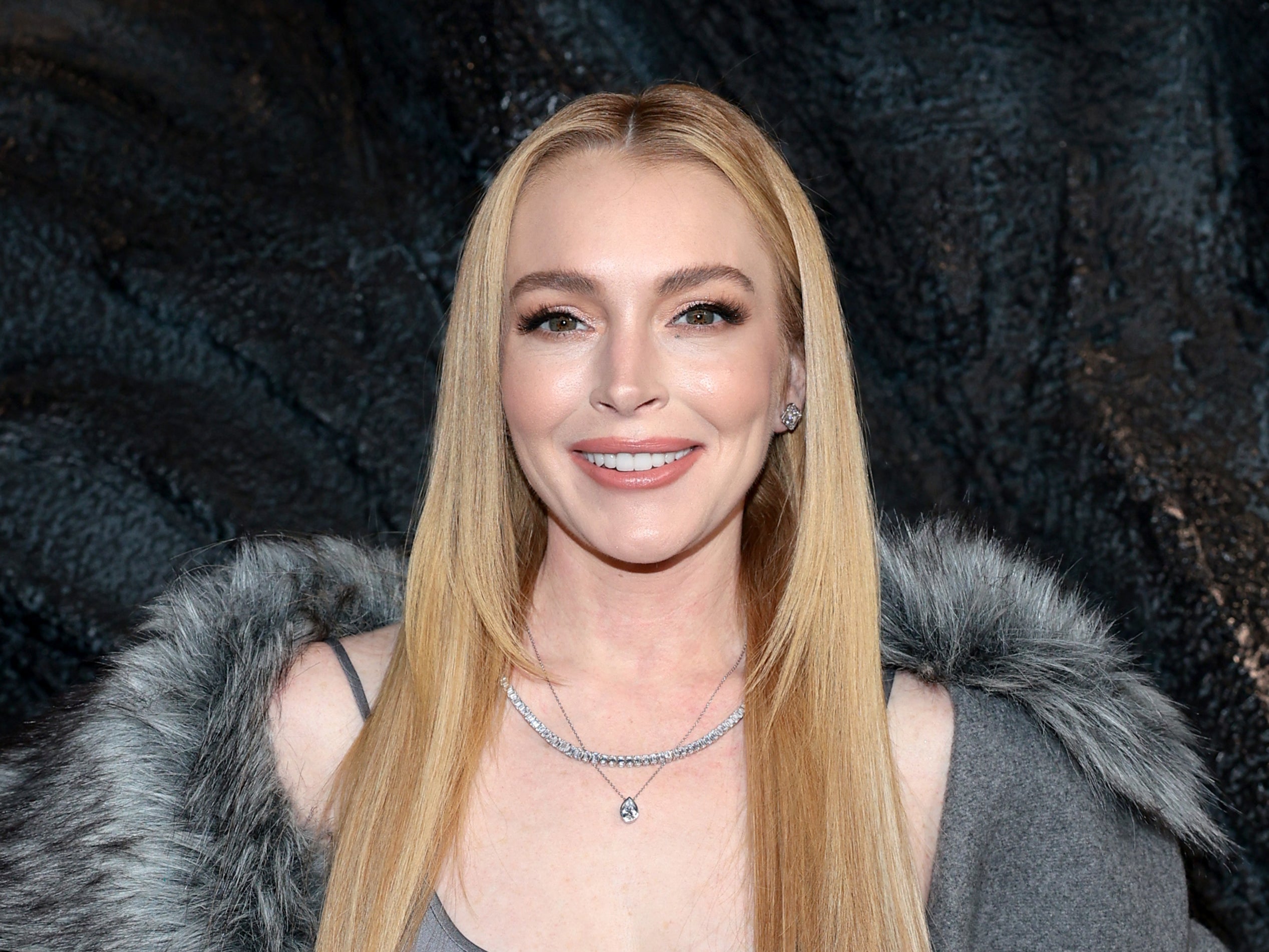 Lindsay Lohan’s dad defends his daughter’s appearance against plastic surgery claims