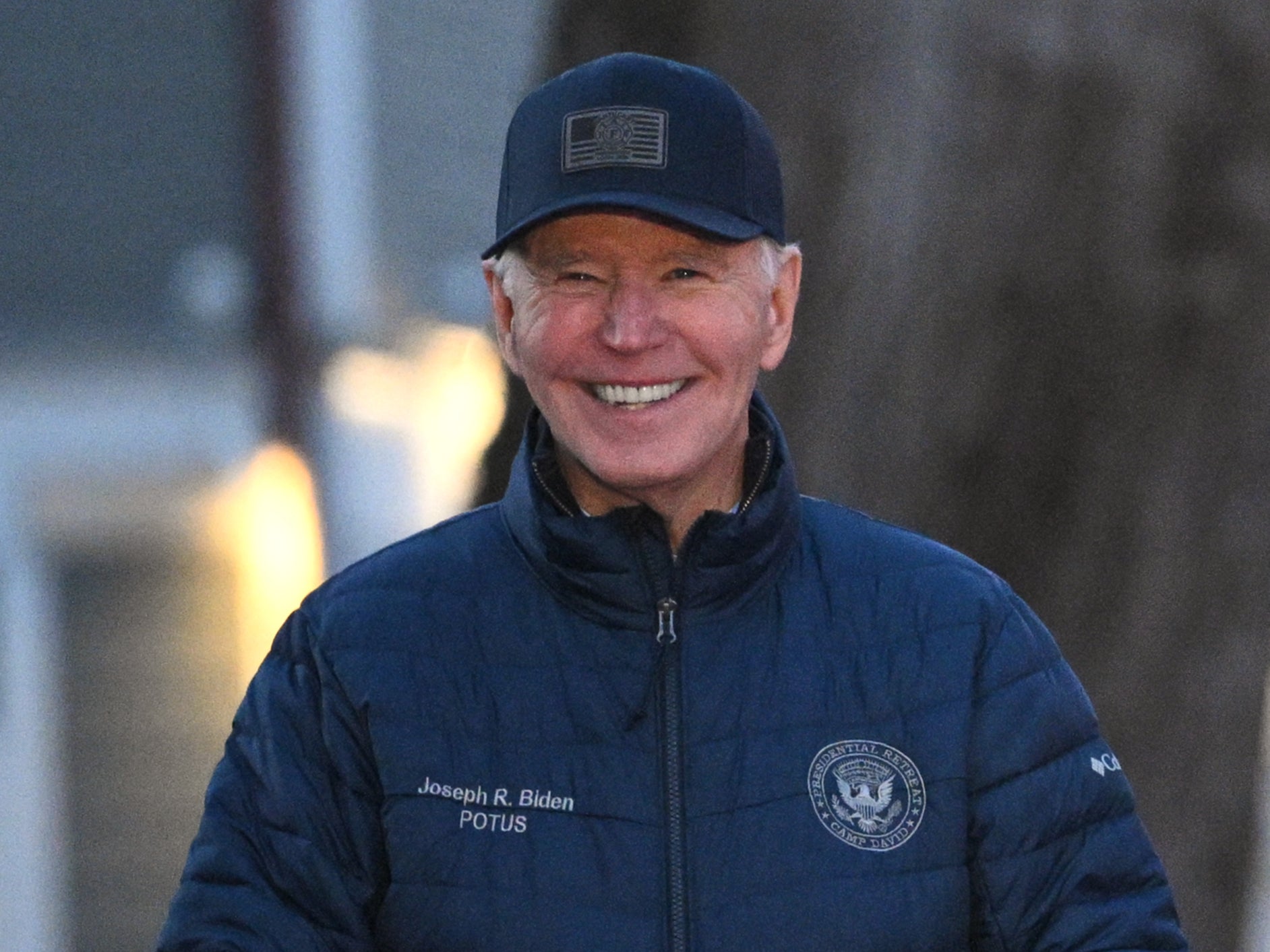 President Joe Biden smiles as he attends a Christmas tree lighting in Nantucket, Massachusetts