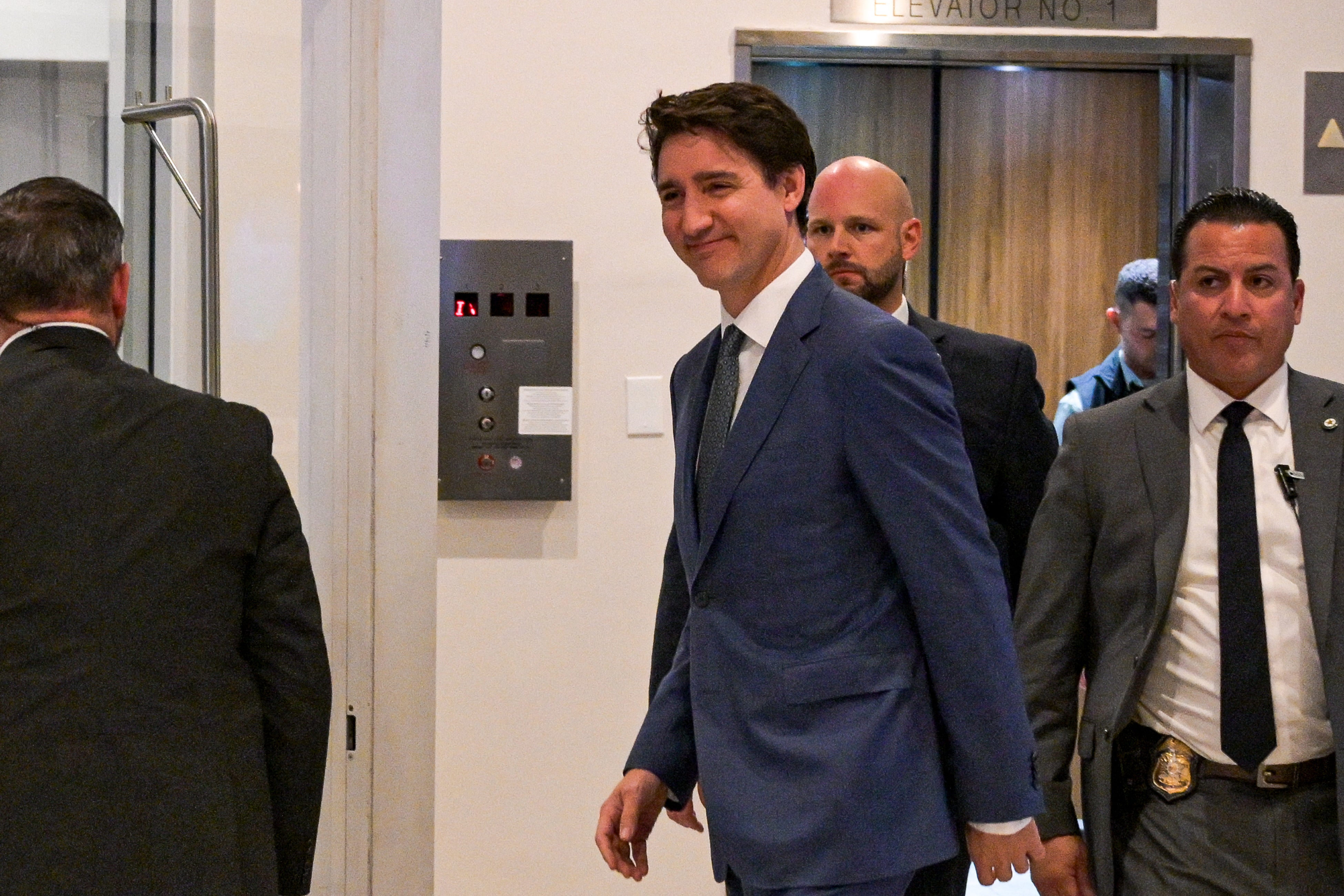 Canadian Prime Minister Justin Treadeau leaves his hotel as he heads to meet US President Donald Trump in West Palm Beach, Florida