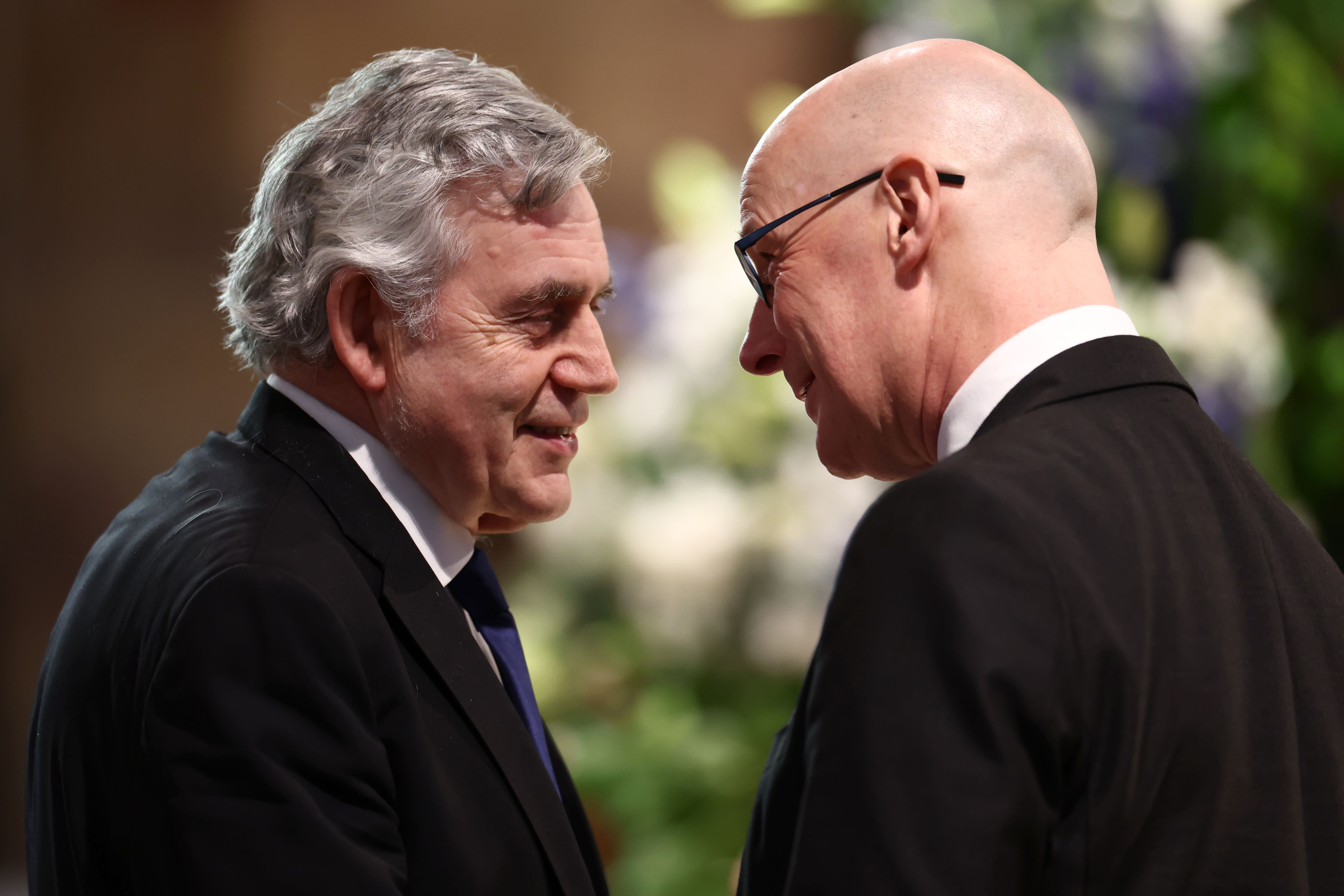 Former prime minister Gordon Brown (left) and First Minister John Swinney were both among the congregation at a service to commemorate the life of Alex Salmond (Jeff J Mitchell/PA)