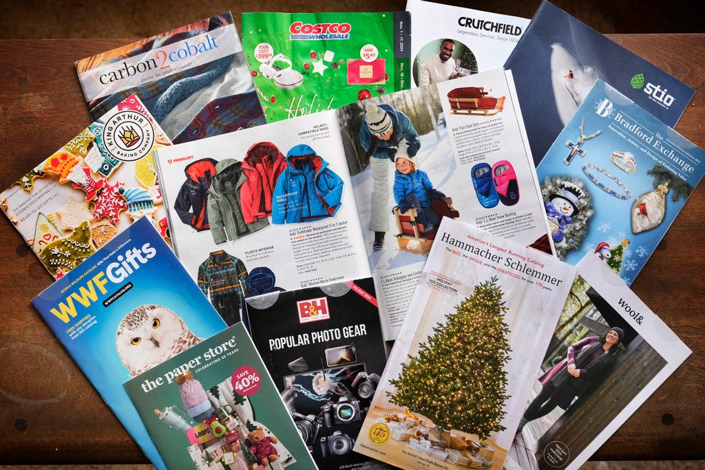 A collection of 2024 holiday catalogs are displayed Monday, Nov. 25, 2024, in Freeport, Maine