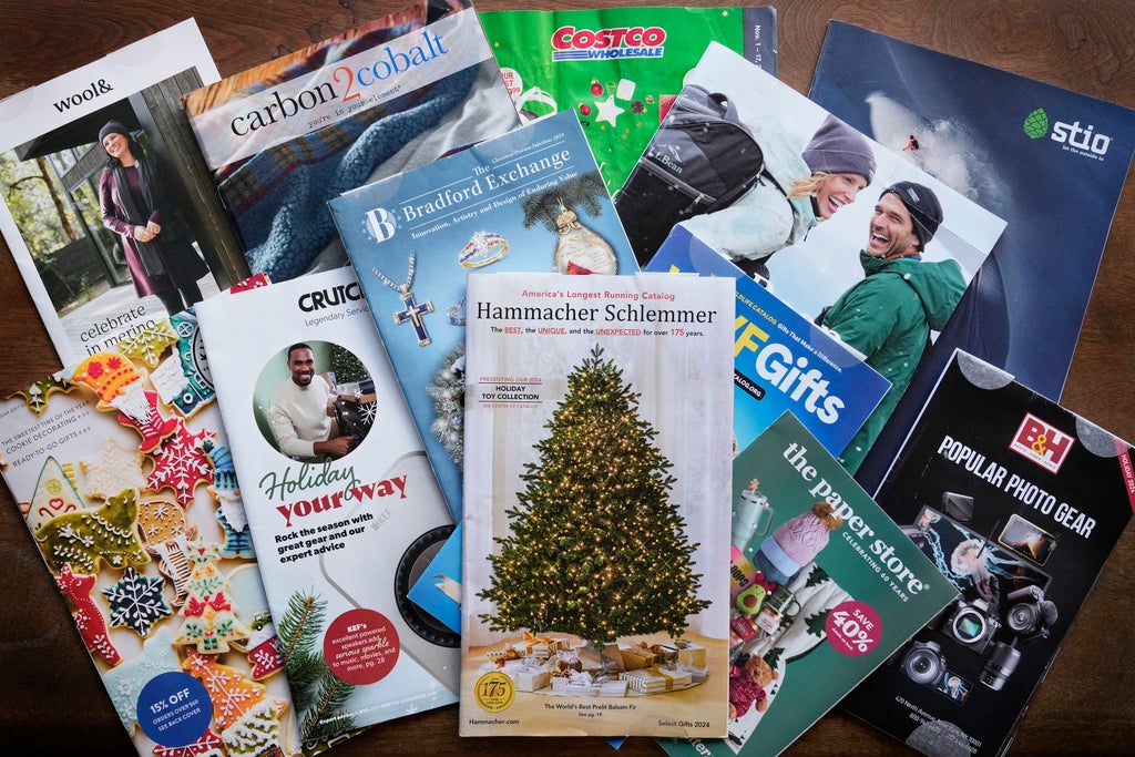 A collection of 2024 holiday catalogs are displayed Monday, Nov. 25, 2024, in Freeport, Maine