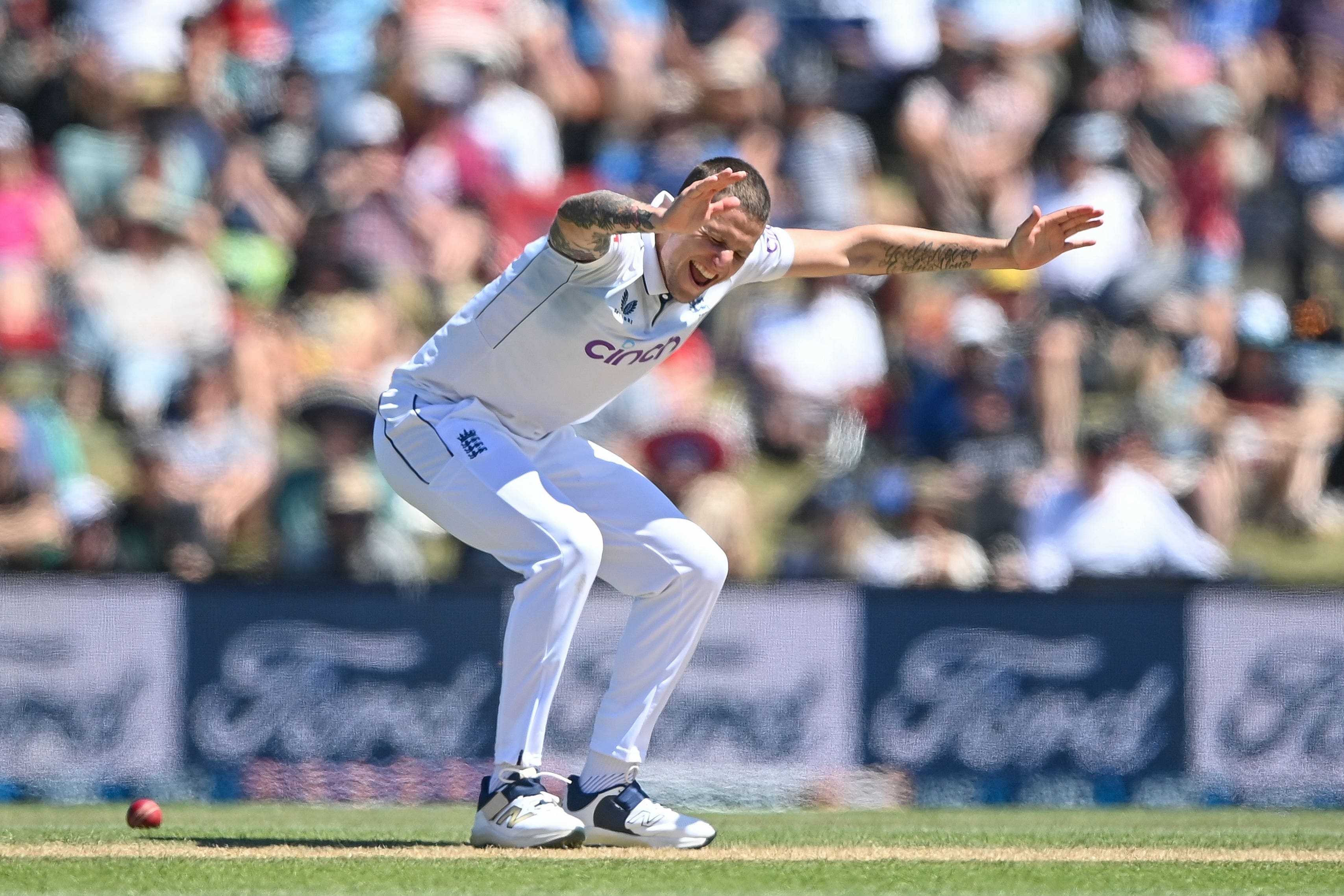 England’s Brydon Carse celebrates after taking the wicket of New Zealand’s Nathan Smith (John Davidson/Photosport/AP)