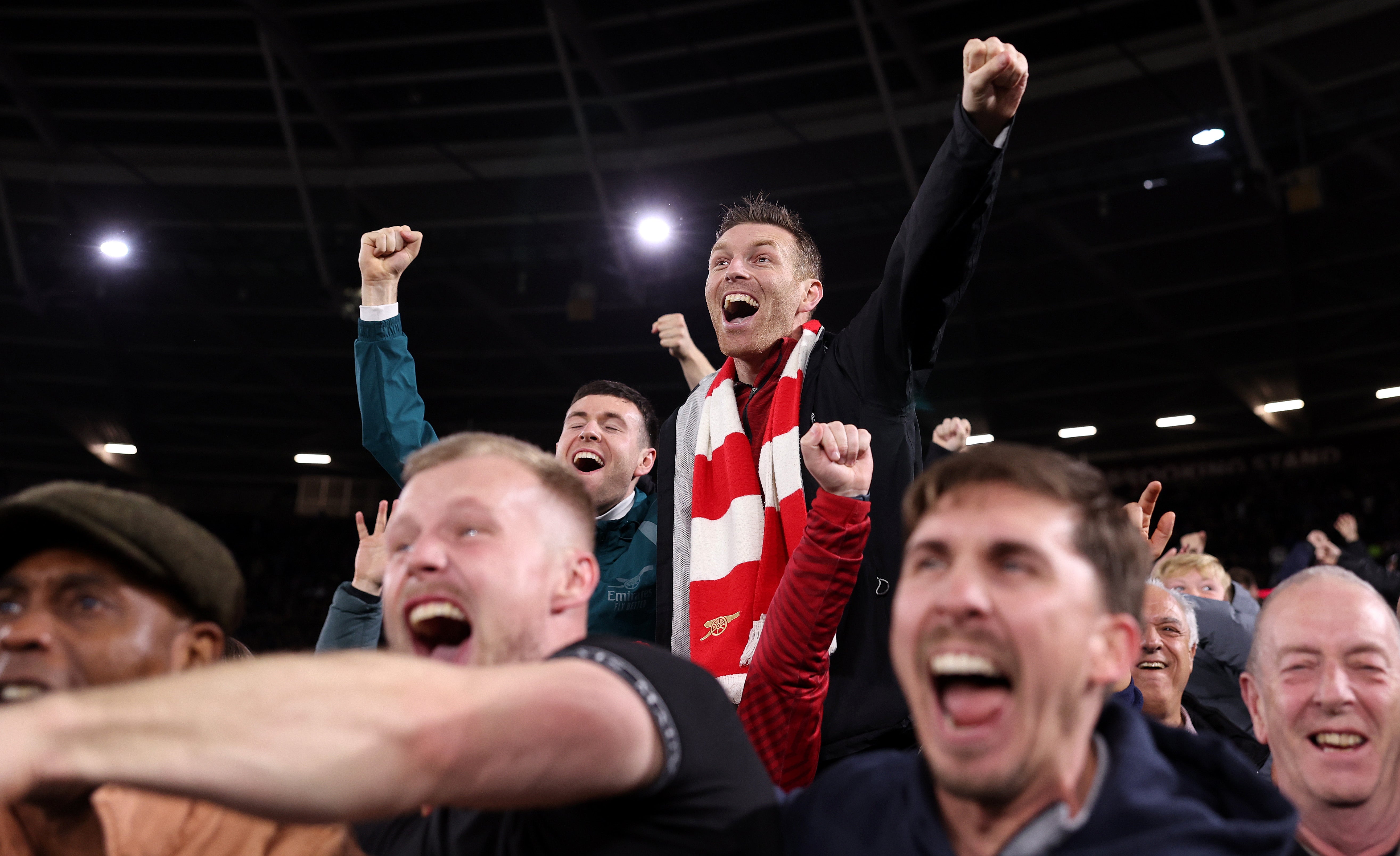 Arsenal fans celebrate at West Ham