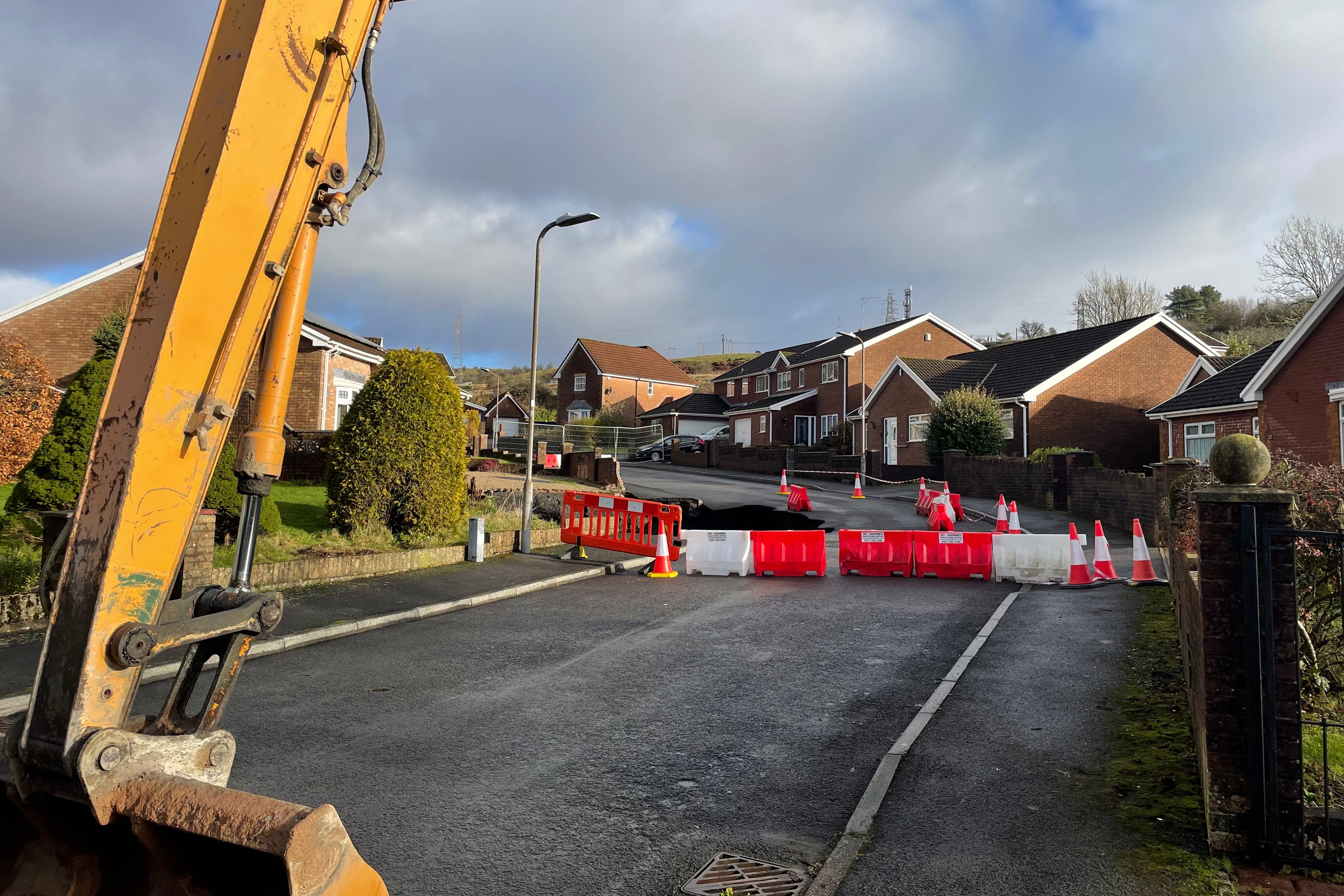 Around 30 residents of Pant, near Merthyr Tydfil, were evacuated after a huge sinkhole opened in the street. (George Thompson/PA)