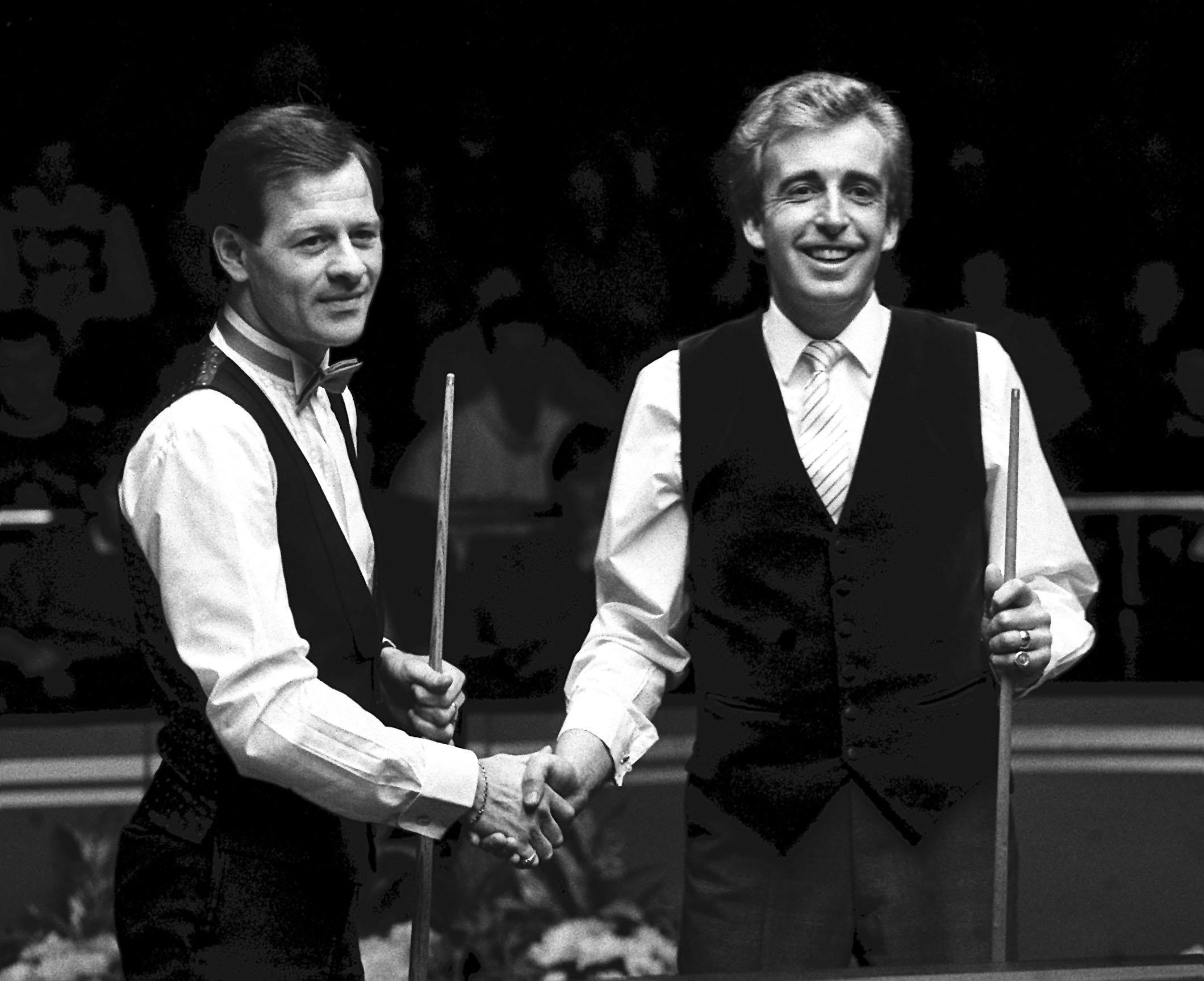 Griffiths with fellow former world snooker champion Alex Higgins, who died in 2010