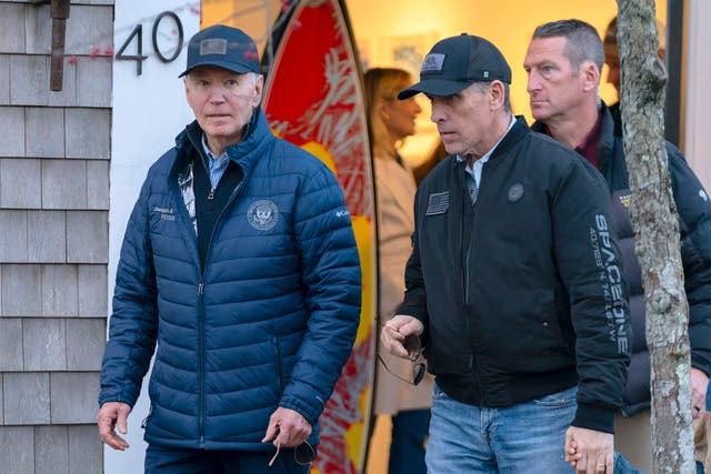 <p>President Joe Biden and son Hunter Biden walk in downtown Nantucket Mass. before the president’s announcement that he would pardon his son. </p>