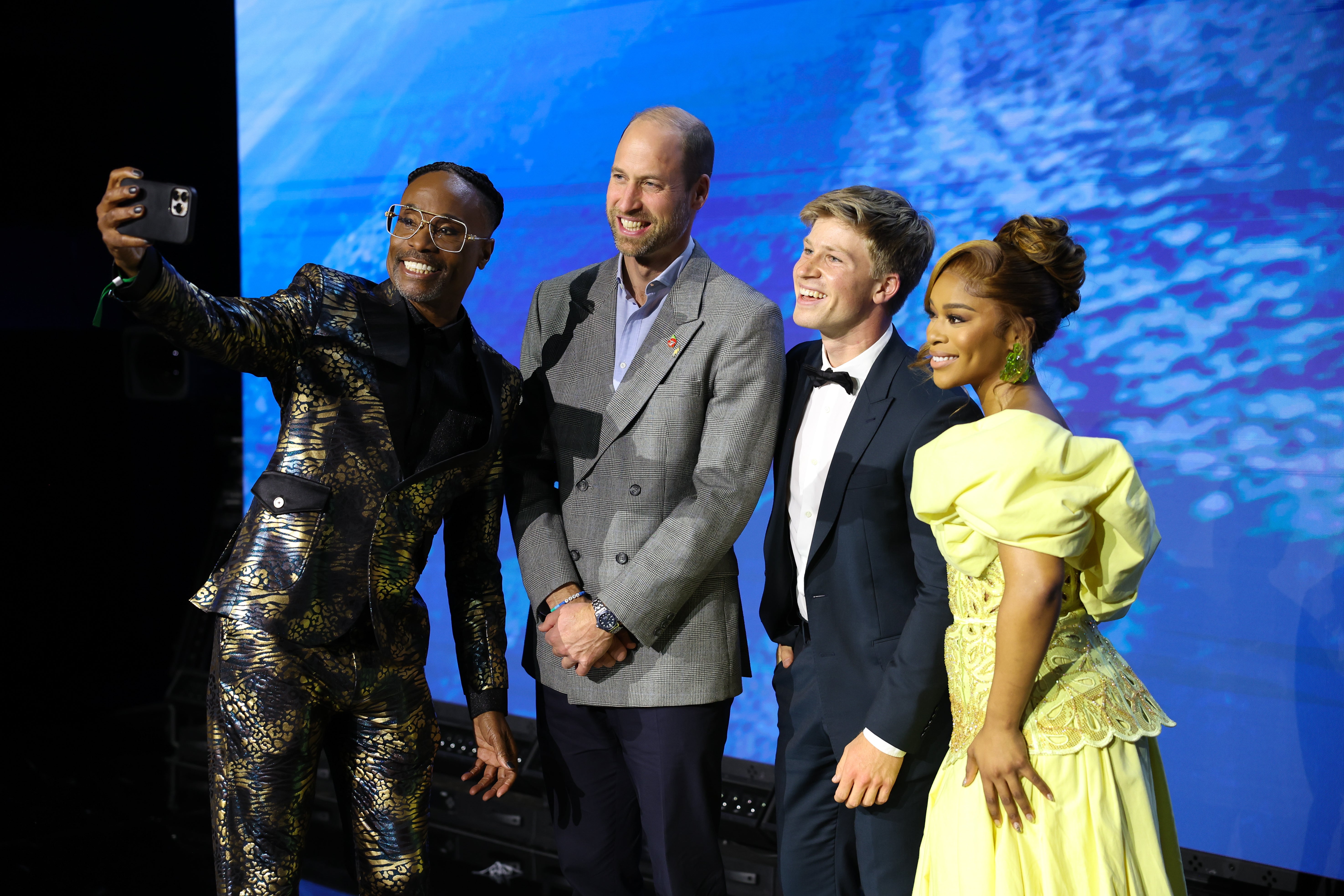 Billy Porter takes a selfie with the Prince of Wales and Earthshot ambassadors Robert Irwin and Nomzamo Mbatha during the Earthshot Prize Awards in Cape Town