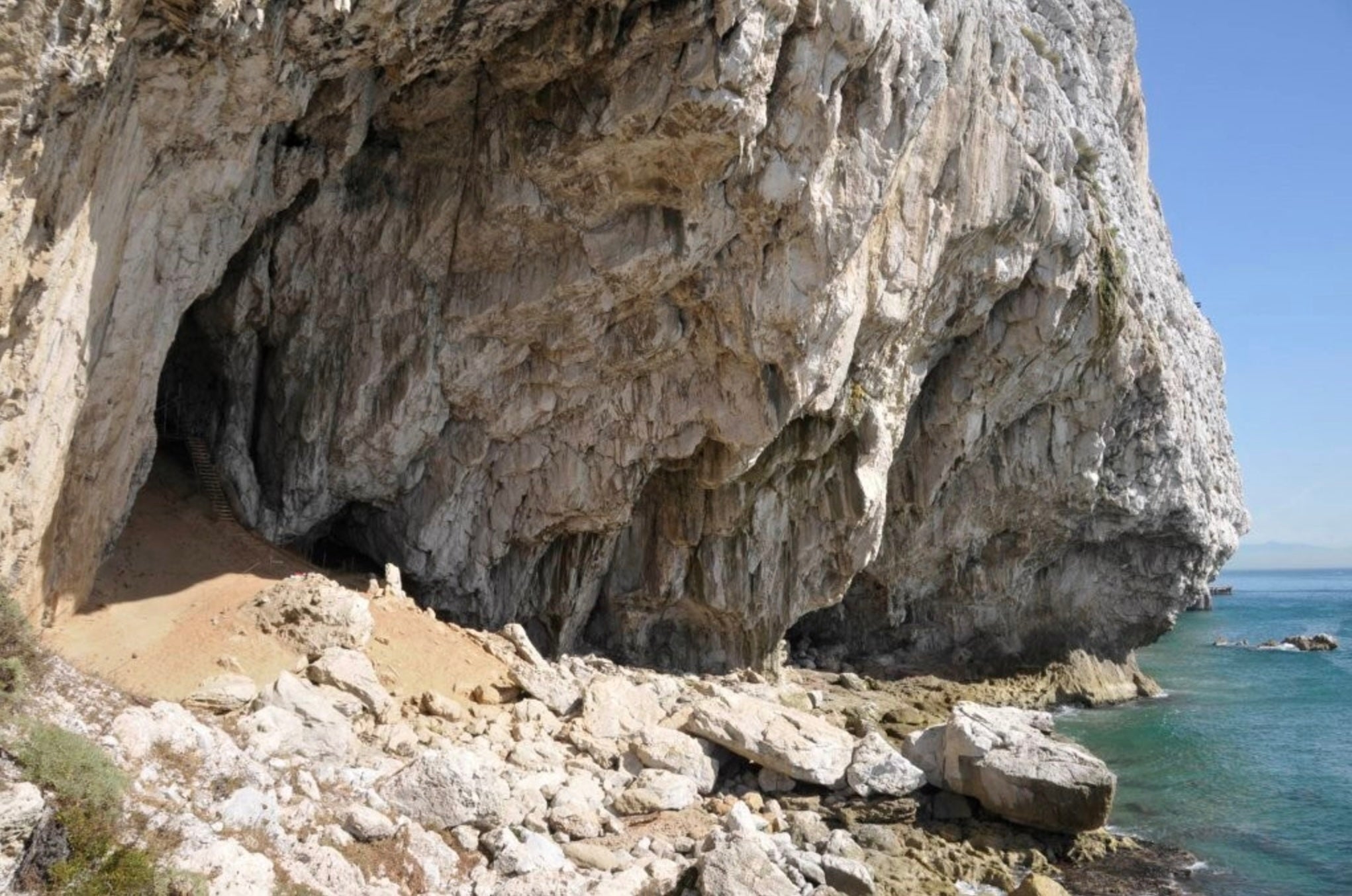 Archaeologists have discovered a structure used by Neanderthals tens of thousands of years ago in what is now Gibraltar, including a pit dug into the ground in the coastal cave Vanguard Cave